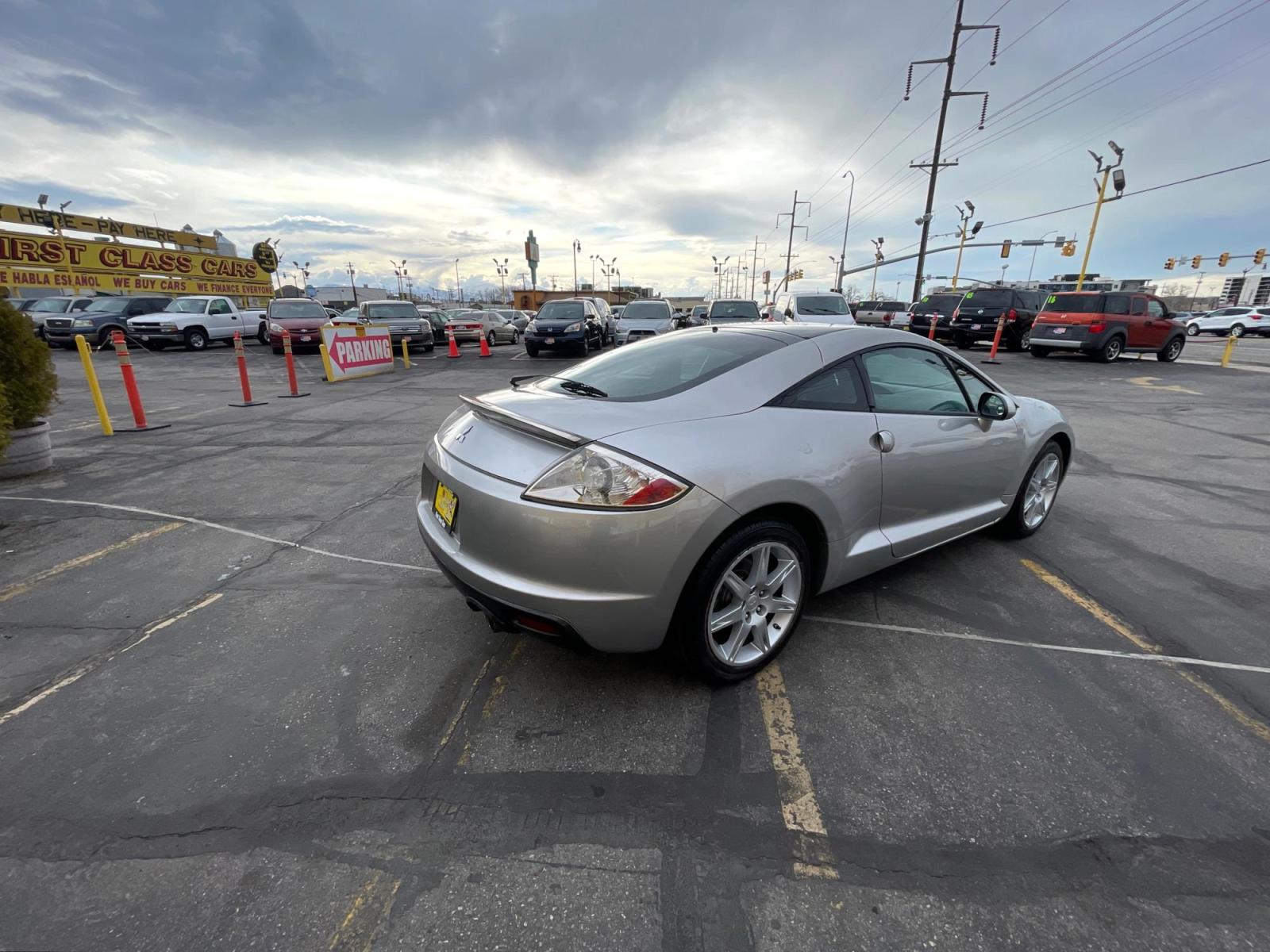 2012 Quick Silver Pearl /Gray Cloth Mitsubishi Eclipse GS Sport (4A31K5DF5CE) with an 2.4L 4 Cyl. engine, Automatic transmission, located at 801 South State Street, Salt Lake City, UT, 84111, (801) 328-0098, 40.751953, -111.888206 - Life is crazy. Now is the time to buy! All of our prices are just dollars above our cost. These prices will change as soon as life isn't so crazy. So please call or come in. We are here to save you a lot of money! Our service department is OPEN DAILY to help with any of your service needs. P - Photo #3