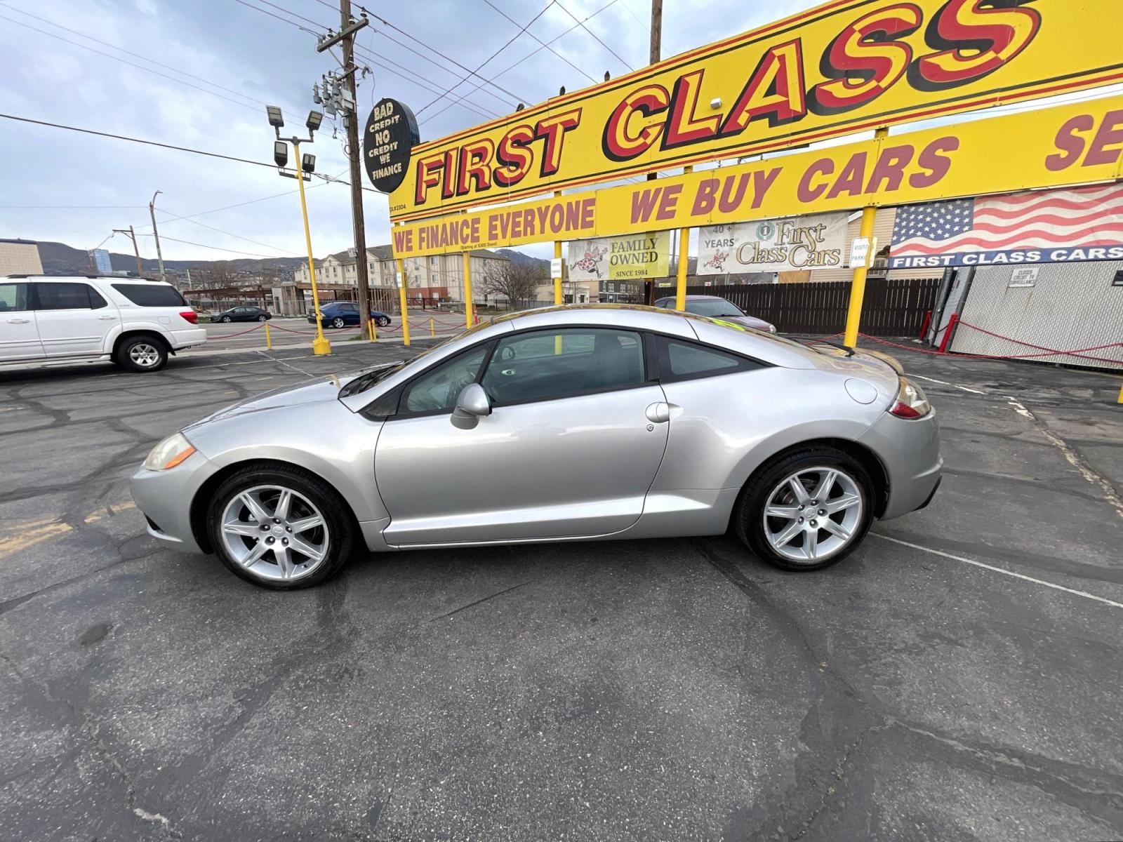 2012 Quick Silver Pearl /Gray Cloth Mitsubishi Eclipse GS Sport (4A31K5DF5CE) with an 2.4L 4 Cyl. engine, Automatic transmission, located at 801 South State Street, Salt Lake City, UT, 84111, (801) 328-0098, 40.751953, -111.888206 - Life is crazy. Now is the time to buy! All of our prices are just dollars above our cost. These prices will change as soon as life isn't so crazy. So please call or come in. We are here to save you a lot of money! Our service department is OPEN DAILY to help with any of your service needs. P - Photo #6