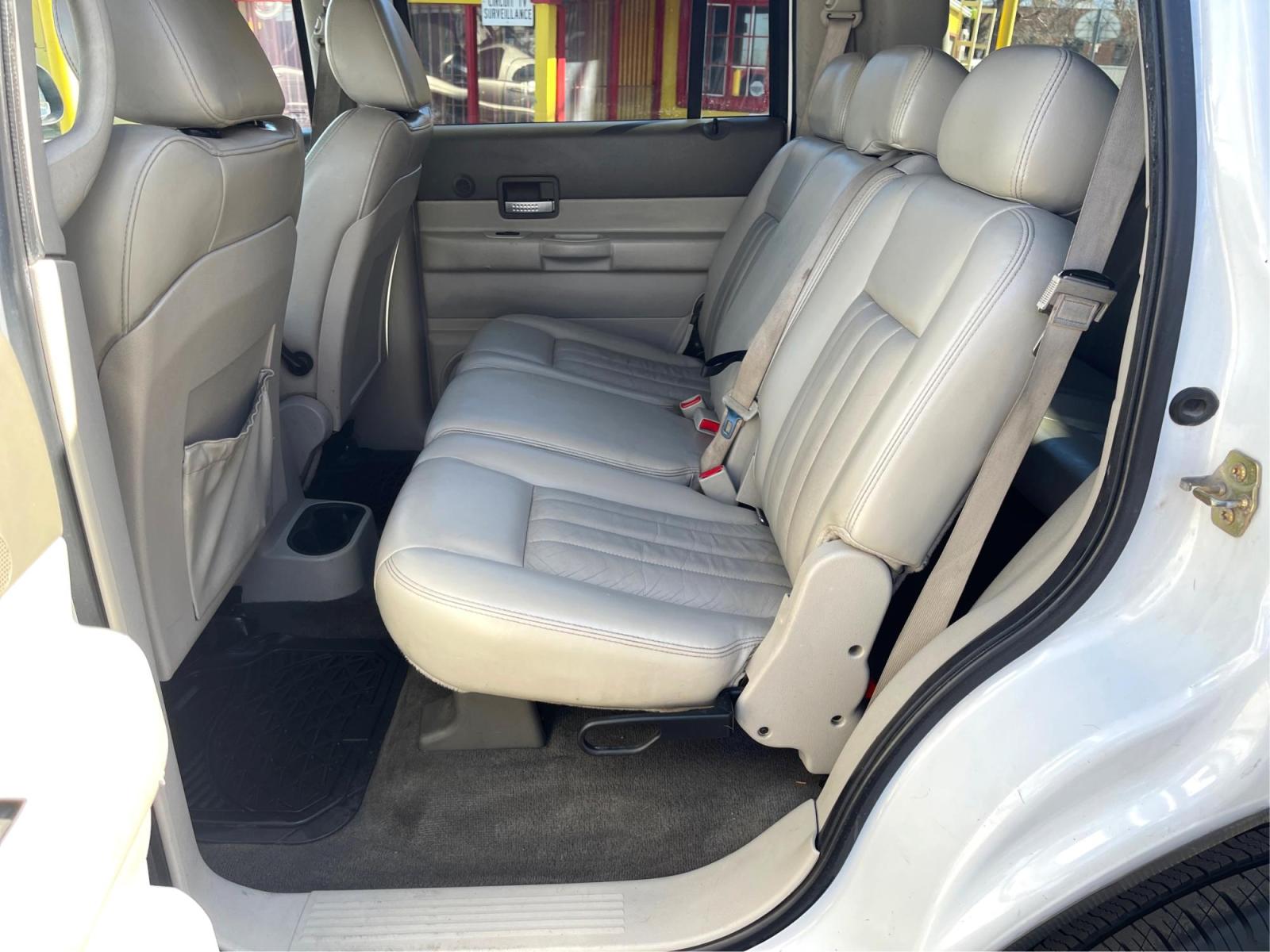 2005 Pure White /TAN Dodge Durango LIMITED (1D4HB58N65F) with an 4.7 LITER V8 engine, AUTOMATIC transmission, located at 801 South State Street, Salt Lake City, UT, 84111, (801) 328-0098, 40.751953, -111.888206 - 2005 Dodge Durango Limited 4x4 Features: 4x4, 4.7 Liter V8, AM,FM,CD, Automatic, Power Windows, Power Locks, Power Seats, Tow Package, Leather Seats, Heated Seats, Alloy Wheels, Roof Rack - Photo #9