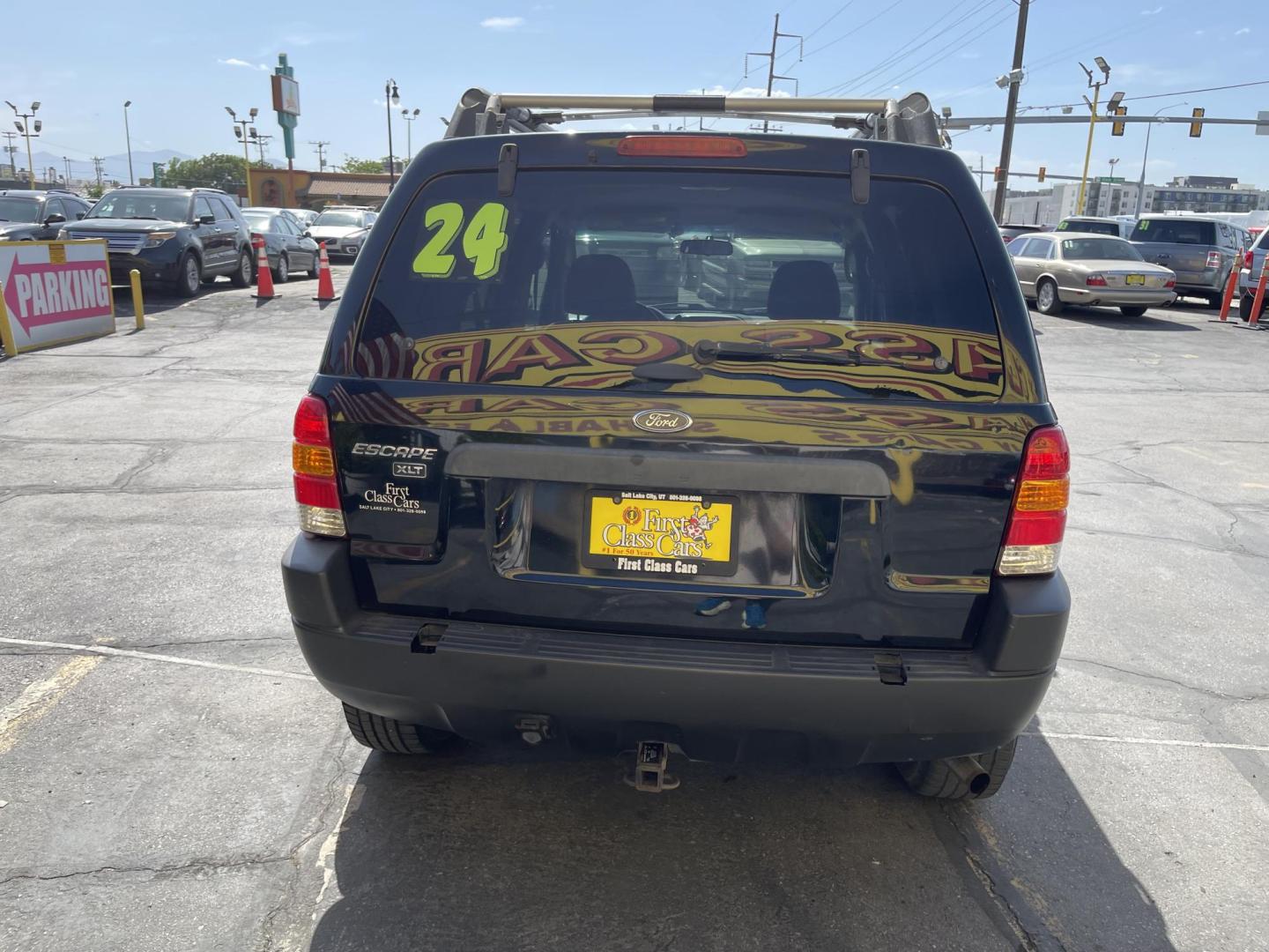 2003 Ebony /Gray Cloth Ford Escape XLT 4WD (1FMYU93123K) with an 3.0L V6 engine, Automatic transmission, located at 801 South State Street, Salt Lake City, UT, 84111, (801) 328-0098, 40.751953, -111.888206 - Clean Title!! Extra clean!! Immaculate condition!! Free Carfax!! Must see!! Warranty available!! Free Carfax!!! Vehicle Features: XLT Model, 4WD/AWD, ABS Brakes, Air Conditioning, Alloy Wheels, AM/FM Stereo, Automatic Transmission, CD Audio, Cloth Seats, Cruise Control, Full Roof Rack, Power Lo - Photo#6