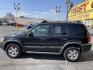 2003 Ebony /Gray Cloth Ford Escape XLT 4WD (1FMYU93123K) with an 3.0L V6 engine, Automatic transmission, located at 801 South State Street, Salt Lake City, UT, 84111, (801) 328-0098, 40.751953, -111.888206 - Clean Title!! Extra clean!! Immaculate condition!! Free Carfax!! Must see!! Warranty available!! Free Carfax!!! Vehicle Features: XLT Model, 4WD/AWD, ABS Brakes, Air Conditioning, Alloy Wheels, AM/FM Stereo, Automatic Transmission, CD Audio, Cloth Seats, Cruise Control, Full Roof Rack, Power Lo - Photo#8
