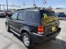 2003 Ebony /Gray Cloth Ford Escape XLT 4WD (1FMYU93123K) with an 3.0L V6 engine, Automatic transmission, located at 801 South State Street, Salt Lake City, UT, 84111, (801) 328-0098, 40.751953, -111.888206 - Clean Title!! Extra clean!! Immaculate condition!! Free Carfax!! Must see!! Warranty available!! Free Carfax!!! Vehicle Features: XLT Model, 4WD/AWD, ABS Brakes, Air Conditioning, Alloy Wheels, AM/FM Stereo, Automatic Transmission, CD Audio, Cloth Seats, Cruise Control, Full Roof Rack, Power Lo - Photo#7