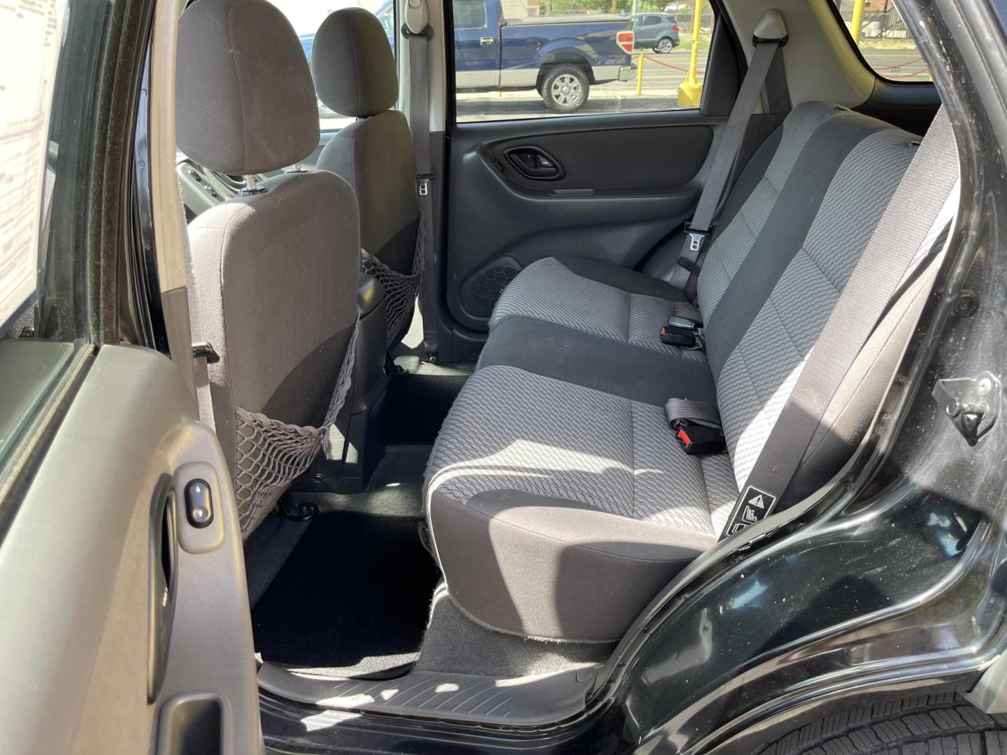 2003 Ebony /Gray Cloth Ford Escape XLT 4WD (1FMYU93123K) with an 3.0L V6 engine, Automatic transmission, located at 801 South State Street, Salt Lake City, UT, 84111, (801) 328-0098, 40.751953, -111.888206 - Clean Title!! Extra clean!! Immaculate condition!! Free Carfax!! Must see!! Warranty available!! Free Carfax!!! Vehicle Features: XLT Model, 4WD/AWD, ABS Brakes, Air Conditioning, Alloy Wheels, AM/FM Stereo, Automatic Transmission, CD Audio, Cloth Seats, Cruise Control, Full Roof Rack, Power Lo - Photo#10