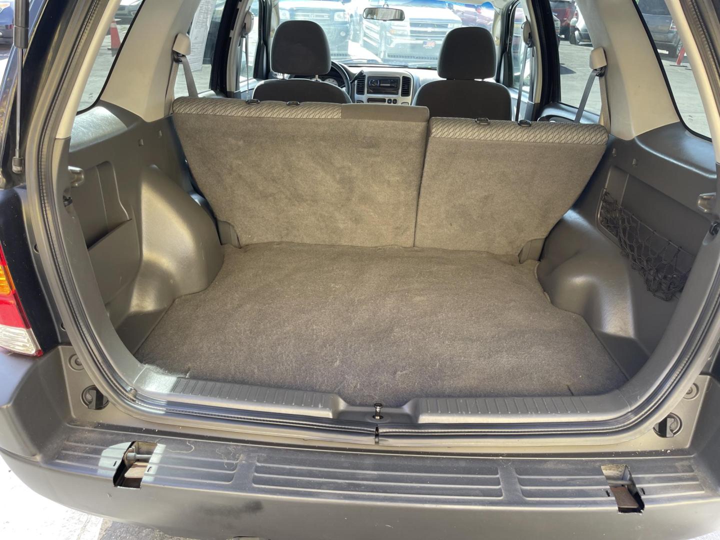2003 Ebony /Gray Cloth Ford Escape XLT 4WD (1FMYU93123K) with an 3.0L V6 engine, Automatic transmission, located at 801 South State Street, Salt Lake City, UT, 84111, (801) 328-0098, 40.751953, -111.888206 - Clean Title!! Extra clean!! Immaculate condition!! Free Carfax!! Must see!! Warranty available!! Free Carfax!!! Vehicle Features: XLT Model, 4WD/AWD, ABS Brakes, Air Conditioning, Alloy Wheels, AM/FM Stereo, Automatic Transmission, CD Audio, Cloth Seats, Cruise Control, Full Roof Rack, Power Lo - Photo#21