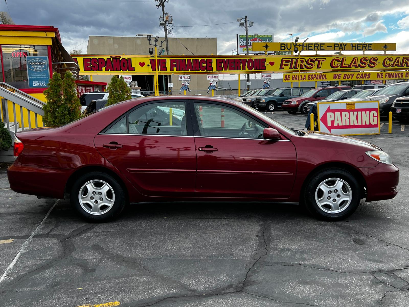 2003 Salsa Red Pearl /Gray Cloth Toyota Camry LE V6 (4T1BF32K03U) with an 3.0L V6 engine, Automatic transmission, located at 801 South State Street, Salt Lake City, UT, 84111, (801) 328-0098, 40.751953, -111.888206 - Life is crazy. Now is the time to buy! All of our prices are just dollars above our cost. These prices will change as soon as life isn't so crazy. So please call or come in. We are here to save you a lot of money! Our service department is OPEN DAILY to help with any of your service needs. P - Photo #5