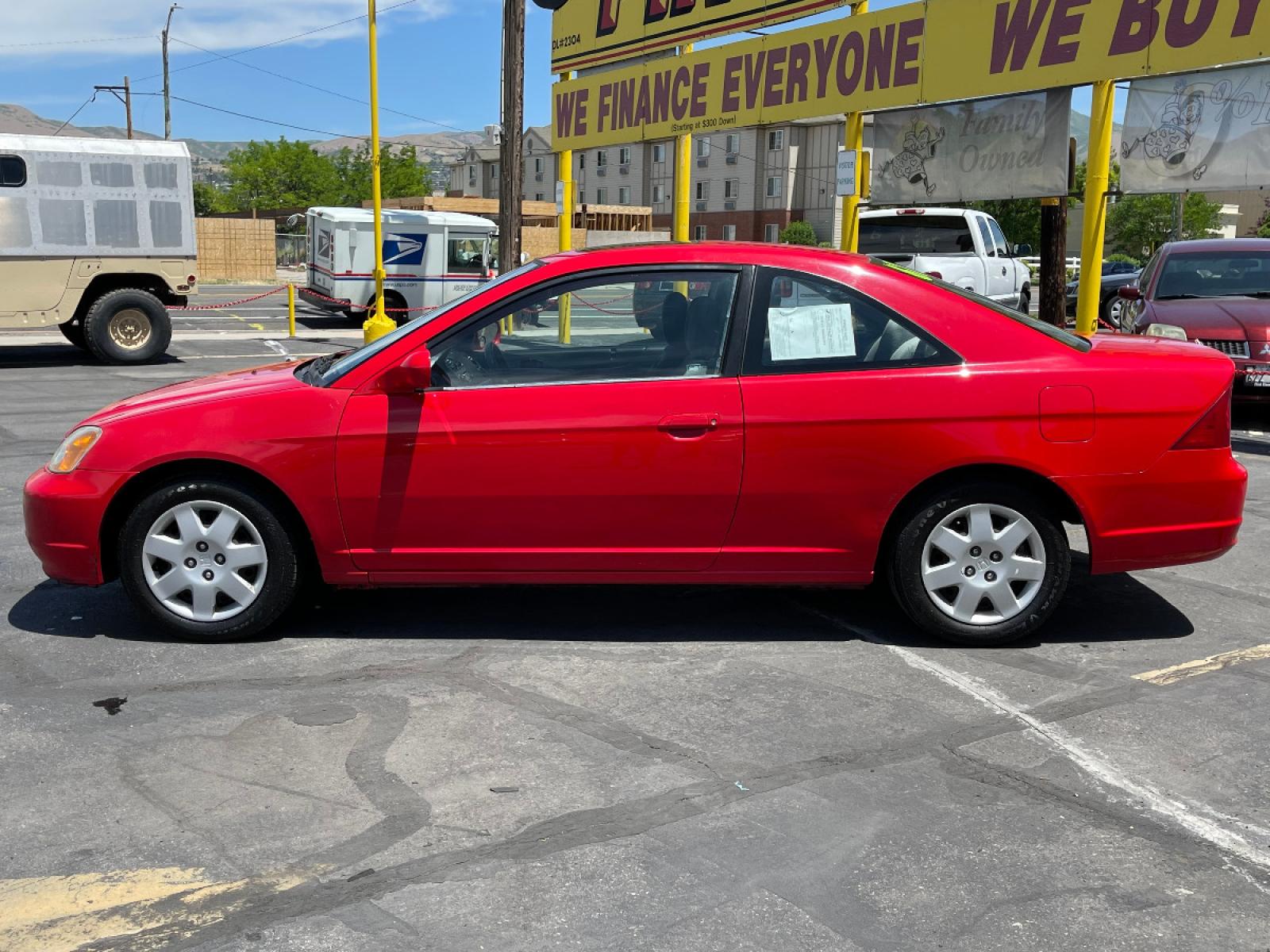2001 Rallye Red /Gray Cloth Honda Civic EX (1HGEM219X1L) with an 1.7L 4 Cyl. engine, Manual transmission, located at 801 South State Street, Salt Lake City, UT, 84111, (801) 328-0098, 40.751953, -111.888206 - Life is crazy. Now is the time to buy! All of our prices are just dollars above our cost. These prices will change as soon as life isn't so crazy. So please call or come in. We are here to save you a lot of money! Our service department is OPEN DAILY to help with any of your service needs. P - Photo #1