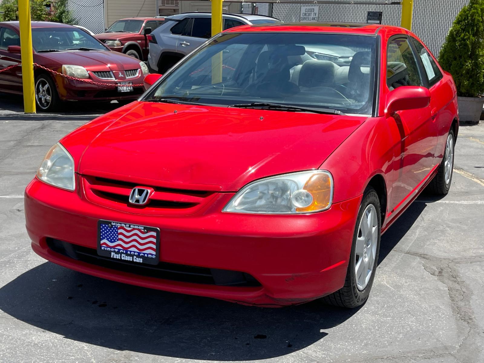 2001 Rallye Red /Gray Cloth Honda Civic EX (1HGEM219X1L) with an 1.7L 4 Cyl. engine, Manual transmission, located at 801 South State Street, Salt Lake City, UT, 84111, (801) 328-0098, 40.751953, -111.888206 - Life is crazy. Now is the time to buy! All of our prices are just dollars above our cost. These prices will change as soon as life isn't so crazy. So please call or come in. We are here to save you a lot of money! Our service department is OPEN DAILY to help with any of your service needs. P - Photo #2