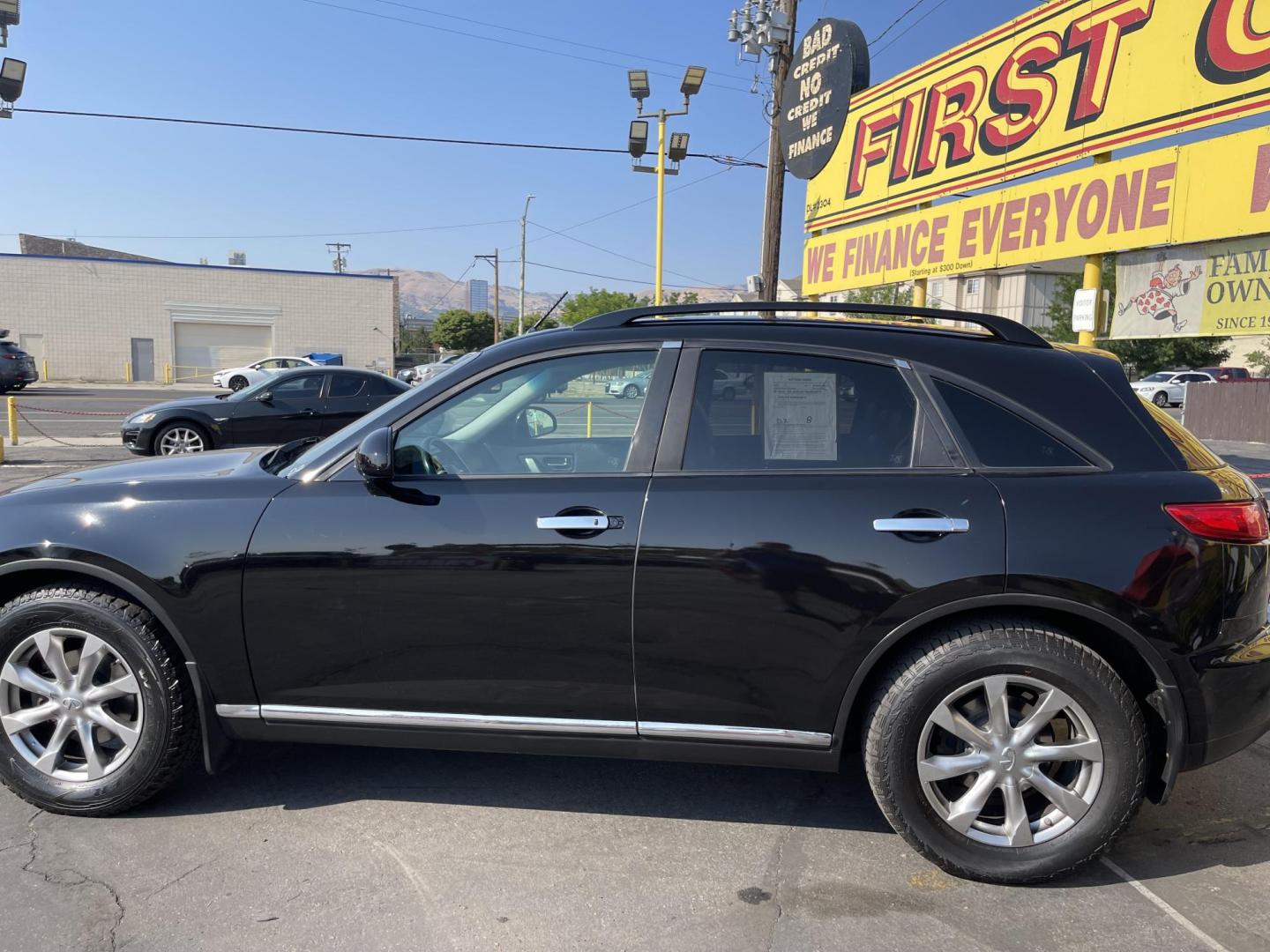 2007 Black Obsidian /Black Leather Infiniti FX AWD (JNRAS08W77X) with an 3.5L V6 engine, Automatic transmission, located at 801 South State Street, Salt Lake City, UT, 84111, (801) 328-0098, 40.751953, -111.888206 - Vehicle Features: 4WD/AWD, ABS Brakes, Air Conditioning, Alloy Wheels, AM/FM Stereo, Automatic Transmission, Bluetooth Technology, BOSE Sound System, CD Audio, Cruise Control, Front Seat Heaters, Leather Seats, Memory Seat(s), Navigation System, Overhead Airbags, Power Locks, Power Mirrors, Power - Photo#11