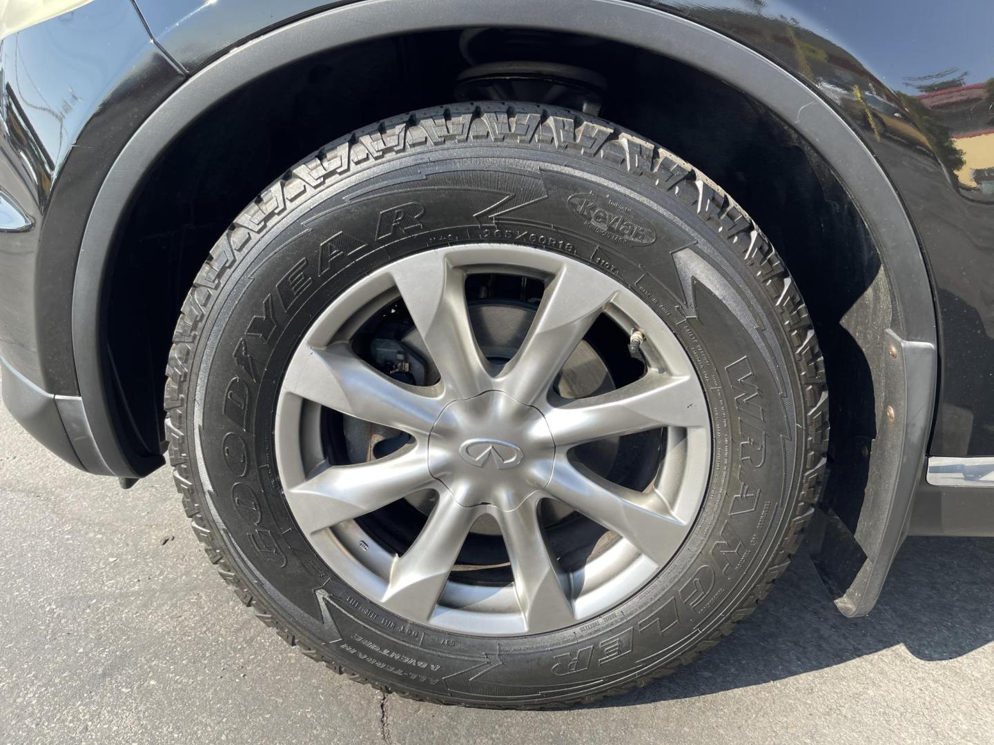 2007 Black Obsidian /Black Leather Infiniti FX AWD (JNRAS08W77X) with an 3.5L V6 engine, Automatic transmission, located at 801 South State Street, Salt Lake City, UT, 84111, (801) 328-0098, 40.751953, -111.888206 - Vehicle Features: 4WD/AWD, ABS Brakes, Air Conditioning, Alloy Wheels, AM/FM Stereo, Automatic Transmission, Bluetooth Technology, BOSE Sound System, CD Audio, Cruise Control, Front Seat Heaters, Leather Seats, Memory Seat(s), Navigation System, Overhead Airbags, Power Locks, Power Mirrors, Power - Photo#13