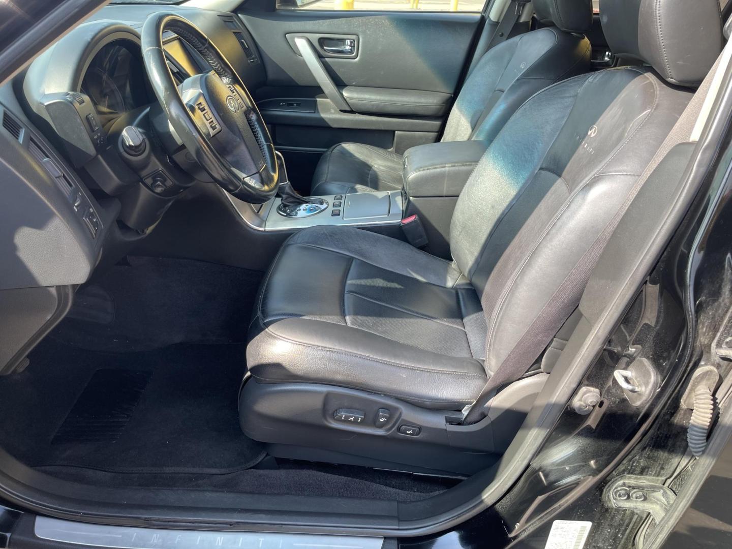 2007 Black Obsidian /Black Leather Infiniti FX AWD (JNRAS08W77X) with an 3.5L V6 engine, Automatic transmission, located at 801 South State Street, Salt Lake City, UT, 84111, (801) 328-0098, 40.751953, -111.888206 - Vehicle Features: 4WD/AWD, ABS Brakes, Air Conditioning, Alloy Wheels, AM/FM Stereo, Automatic Transmission, Bluetooth Technology, BOSE Sound System, CD Audio, Cruise Control, Front Seat Heaters, Leather Seats, Memory Seat(s), Navigation System, Overhead Airbags, Power Locks, Power Mirrors, Power - Photo#14