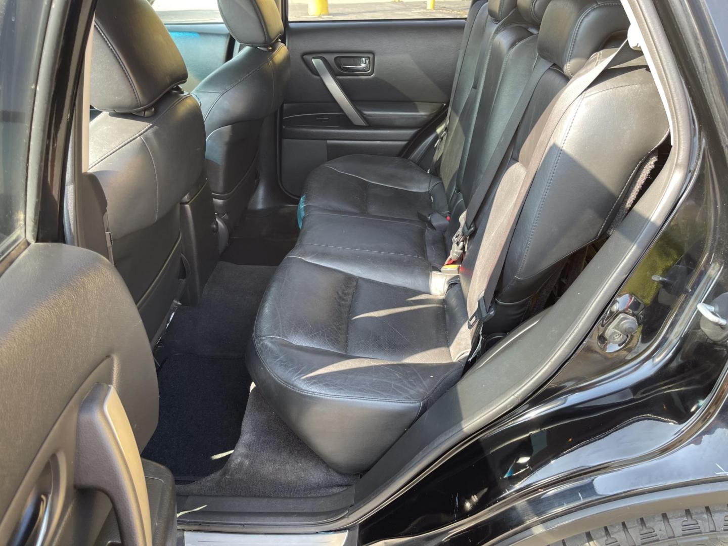 2007 Black Obsidian /Black Leather Infiniti FX AWD (JNRAS08W77X) with an 3.5L V6 engine, Automatic transmission, located at 801 South State Street, Salt Lake City, UT, 84111, (801) 328-0098, 40.751953, -111.888206 - Vehicle Features: 4WD/AWD, ABS Brakes, Air Conditioning, Alloy Wheels, AM/FM Stereo, Automatic Transmission, Bluetooth Technology, BOSE Sound System, CD Audio, Cruise Control, Front Seat Heaters, Leather Seats, Memory Seat(s), Navigation System, Overhead Airbags, Power Locks, Power Mirrors, Power - Photo#15