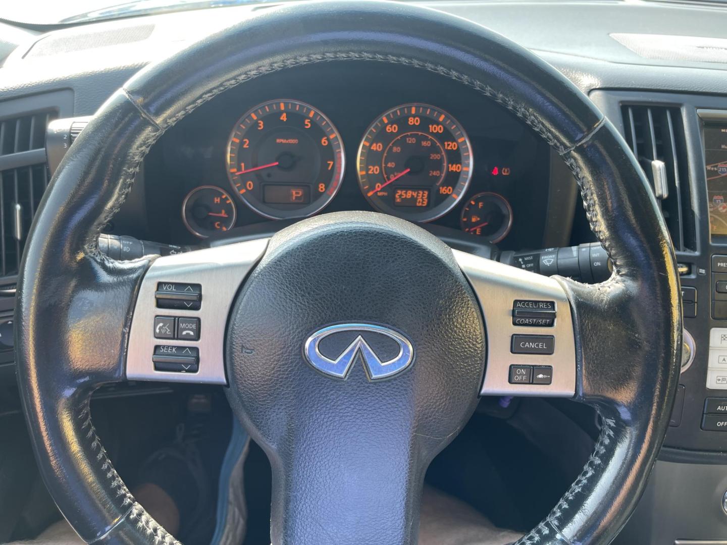 2007 Black Obsidian /Black Leather Infiniti FX AWD (JNRAS08W77X) with an 3.5L V6 engine, Automatic transmission, located at 801 South State Street, Salt Lake City, UT, 84111, (801) 328-0098, 40.751953, -111.888206 - Vehicle Features: 4WD/AWD, ABS Brakes, Air Conditioning, Alloy Wheels, AM/FM Stereo, Automatic Transmission, Bluetooth Technology, BOSE Sound System, CD Audio, Cruise Control, Front Seat Heaters, Leather Seats, Memory Seat(s), Navigation System, Overhead Airbags, Power Locks, Power Mirrors, Power - Photo#22