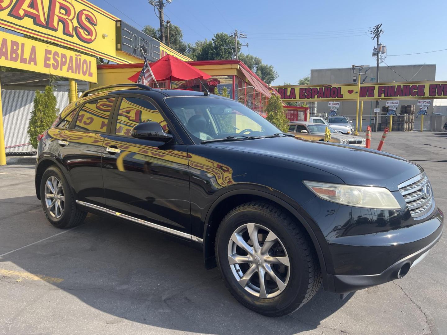 2007 Black Obsidian /Black Leather Infiniti FX AWD (JNRAS08W77X) with an 3.5L V6 engine, Automatic transmission, located at 801 South State Street, Salt Lake City, UT, 84111, (801) 328-0098, 40.751953, -111.888206 - Vehicle Features: 4WD/AWD, ABS Brakes, Air Conditioning, Alloy Wheels, AM/FM Stereo, Automatic Transmission, Bluetooth Technology, BOSE Sound System, CD Audio, Cruise Control, Front Seat Heaters, Leather Seats, Memory Seat(s), Navigation System, Overhead Airbags, Power Locks, Power Mirrors, Power - Photo#4