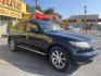 2007 Black Obsidian /Black Leather Infiniti FX AWD (JNRAS08W77X) with an 3.5L V6 engine, Automatic transmission, located at 801 South State Street, Salt Lake City, UT, 84111, (801) 328-0098, 40.751953, -111.888206 - Vehicle Features: 4WD/AWD, ABS Brakes, Air Conditioning, Alloy Wheels, AM/FM Stereo, Automatic Transmission, Bluetooth Technology, BOSE Sound System, CD Audio, Cruise Control, Front Seat Heaters, Leather Seats, Memory Seat(s), Navigation System, Overhead Airbags, Power Locks, Power Mirrors, Power - Photo#4