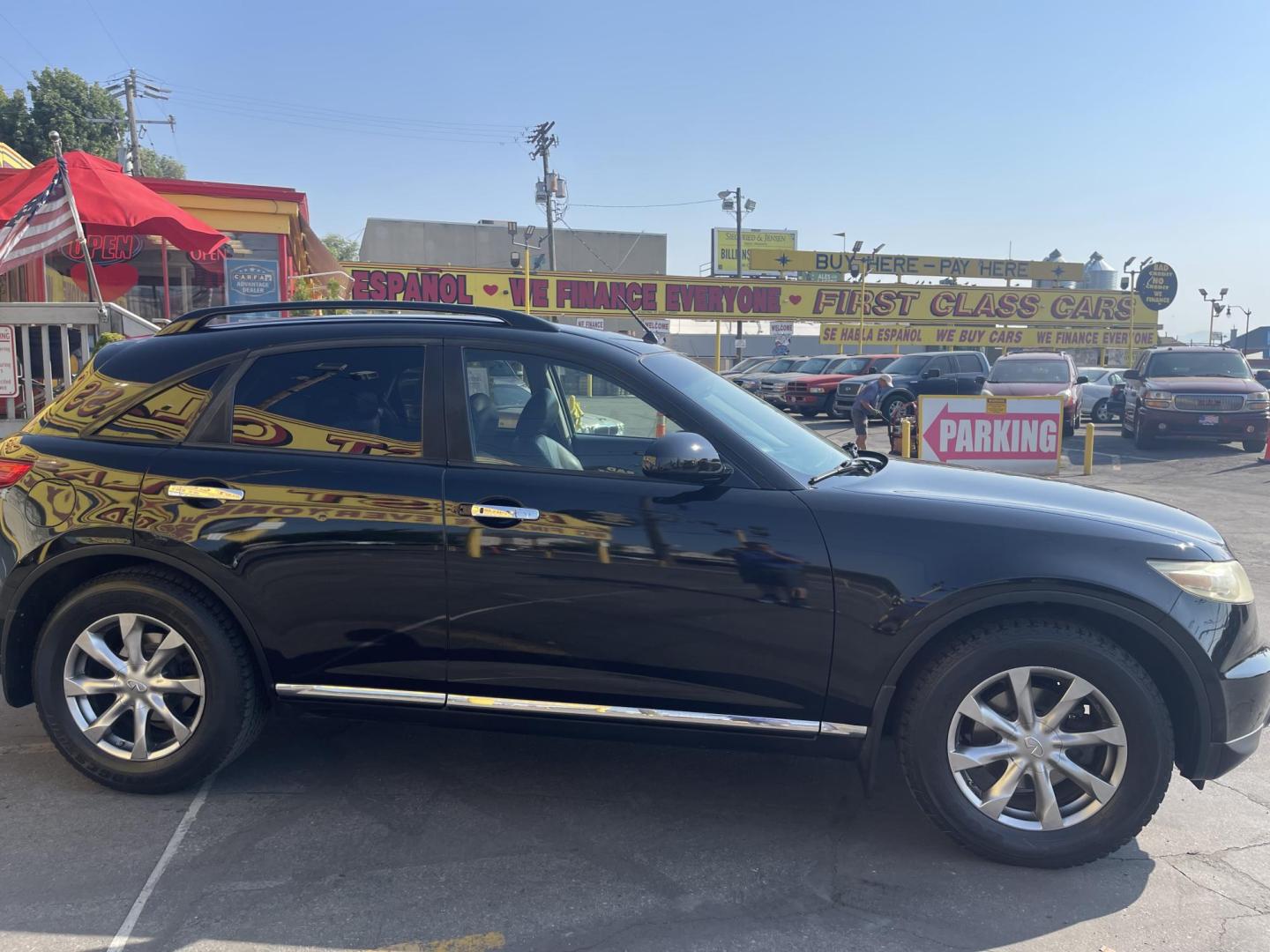 2007 Black Obsidian /Black Leather Infiniti FX AWD (JNRAS08W77X) with an 3.5L V6 engine, Automatic transmission, located at 801 South State Street, Salt Lake City, UT, 84111, (801) 328-0098, 40.751953, -111.888206 - Vehicle Features: 4WD/AWD, ABS Brakes, Air Conditioning, Alloy Wheels, AM/FM Stereo, Automatic Transmission, Bluetooth Technology, BOSE Sound System, CD Audio, Cruise Control, Front Seat Heaters, Leather Seats, Memory Seat(s), Navigation System, Overhead Airbags, Power Locks, Power Mirrors, Power - Photo#5