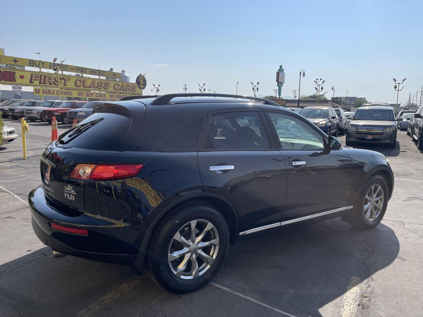2007 Black Obsidian /Black Leather Infiniti FX AWD (JNRAS08W77X) with an 3.5L V6 engine, Automatic transmission, located at 801 South State Street, Salt Lake City, UT, 84111, (801) 328-0098, 40.751953, -111.888206 - Vehicle Features: 4WD/AWD, ABS Brakes, Air Conditioning, Alloy Wheels, AM/FM Stereo, Automatic Transmission, Bluetooth Technology, BOSE Sound System, CD Audio, Cruise Control, Front Seat Heaters, Leather Seats, Memory Seat(s), Navigation System, Overhead Airbags, Power Locks, Power Mirrors, Power - Photo#7