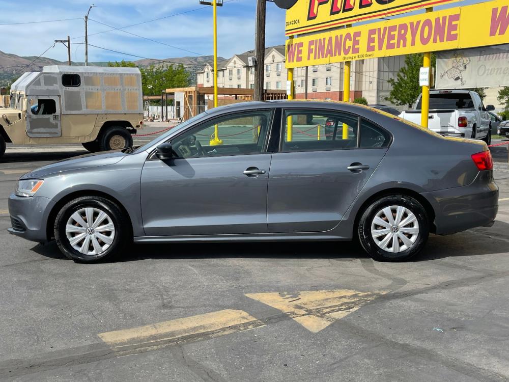 2014 Platinum Gray Metallic /Gray Cloth Volkswagen Jetta S (3VW2K7AJ7EM) with an 2.0L 4 Cyl. engine, Automatic transmission, located at 801 South State Street, Salt Lake City, UT, 84111, (801) 328-0098, 40.751953, -111.888206 - Photo #1