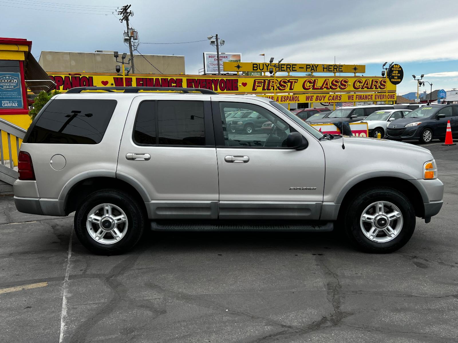 2002 Silver Frost Metallic /Gray Cloth Ford Explorer XLT 4WD (1FMZU73K82Z) with an 4.0L V6 engine, Automatic transmission, located at 801 South State Street, Salt Lake City, UT, 84111, (801) 328-0098, 40.751953, -111.888206 - Vehicle Features: XLT Model, 4WD/AWD, ABS Brakes, Air Conditioning, Alloy Wheels, AM/FM Stereo, Automatic Transmission, CD Audio, Cloth Seats, Cruise Control, Fold-Away Third Row, Full Roof Rack, Power Locks, Power Mirrors, Power Seat(s), Power Windows, Rear Air Conditioning, Rear Defroster, Run - Photo #5