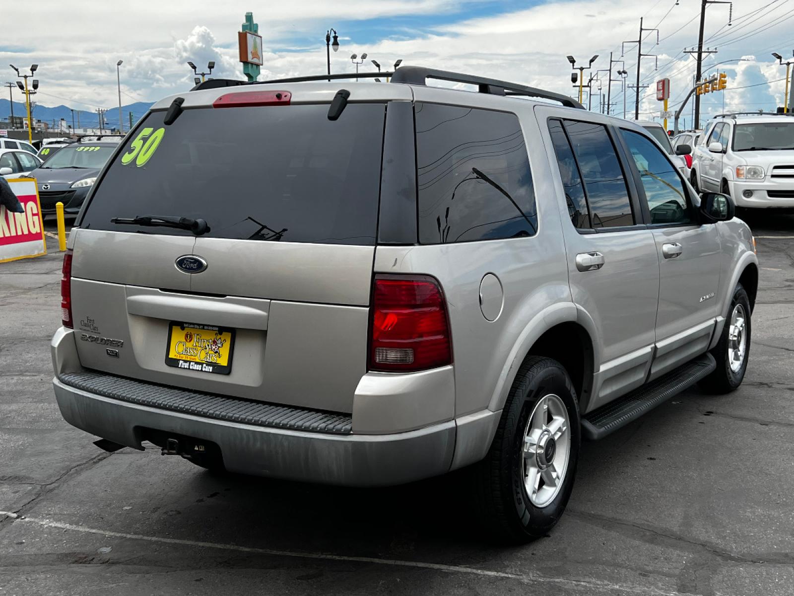 2002 Silver Frost Metallic /Gray Cloth Ford Explorer XLT 4WD (1FMZU73K82Z) with an 4.0L V6 engine, Automatic transmission, located at 801 South State Street, Salt Lake City, UT, 84111, (801) 328-0098, 40.751953, -111.888206 - Vehicle Features: XLT Model, 4WD/AWD, ABS Brakes, Air Conditioning, Alloy Wheels, AM/FM Stereo, Automatic Transmission, CD Audio, Cloth Seats, Cruise Control, Fold-Away Third Row, Full Roof Rack, Power Locks, Power Mirrors, Power Seat(s), Power Windows, Rear Air Conditioning, Rear Defroster, Run - Photo #6