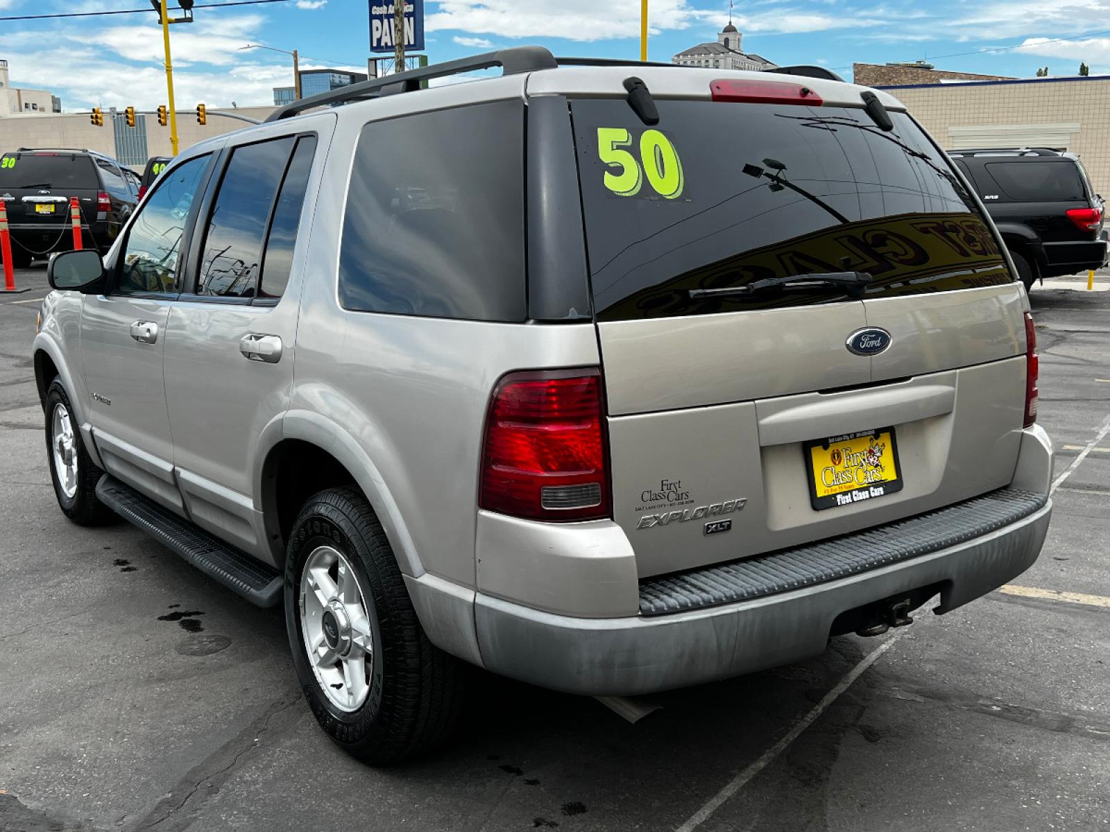 2002 Silver Frost Metallic /Gray Cloth Ford Explorer XLT 4WD (1FMZU73K82Z) with an 4.0L V6 engine, Automatic transmission, located at 801 South State Street, Salt Lake City, UT, 84111, (801) 328-0098, 40.751953, -111.888206 - Vehicle Features: XLT Model, 4WD/AWD, ABS Brakes, Air Conditioning, Alloy Wheels, AM/FM Stereo, Automatic Transmission, CD Audio, Cloth Seats, Cruise Control, Fold-Away Third Row, Full Roof Rack, Power Locks, Power Mirrors, Power Seat(s), Power Windows, Rear Air Conditioning, Rear Defroster, Run - Photo #8