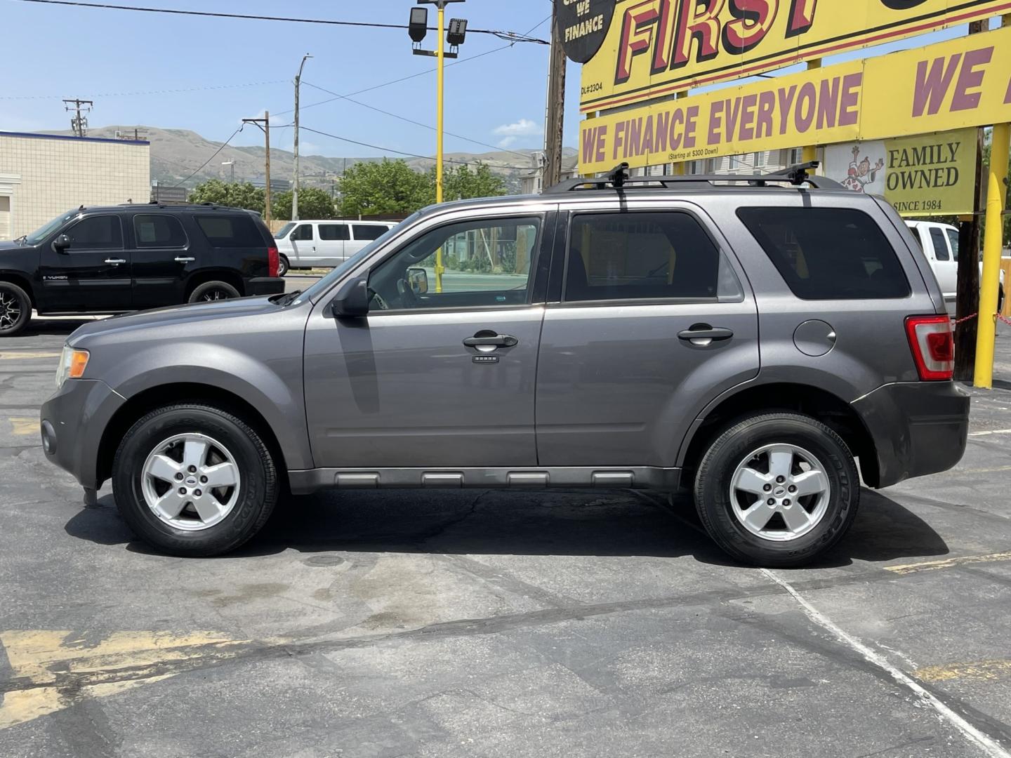 2009 Sterling Gray Metallic /Gray Cloth Ford Escape XLT 4WD V6 (1FMCU93G89K) with an 3.0L V6 engine, Automatic transmission, located at 801 South State Street, Salt Lake City, UT, 84111, (801) 328-0098, 40.751953, -111.888206 - Life is crazy. Now is the time to buy! All of our prices are just dollars above our cost. These prices will change as soon as life isn't so crazy. So please call or come in. We are here to save you a lot of money! Our service department is OPEN DAILY to help with any of your service needs. P- Photo#1