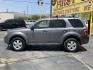 2009 Sterling Gray Metallic /Gray Cloth Ford Escape XLT 4WD V6 (1FMCU93G89K) with an 3.0L V6 engine, Automatic transmission, located at 801 South State Street, Salt Lake City, UT, 84111, (801) 328-0098, 40.751953, -111.888206 - Life is crazy. Now is the time to buy! All of our prices are just dollars above our cost. These prices will change as soon as life isn't so crazy. So please call or come in. We are here to save you a lot of money! Our service department is OPEN DAILY to help with any of your service needs. P- Photo#1
