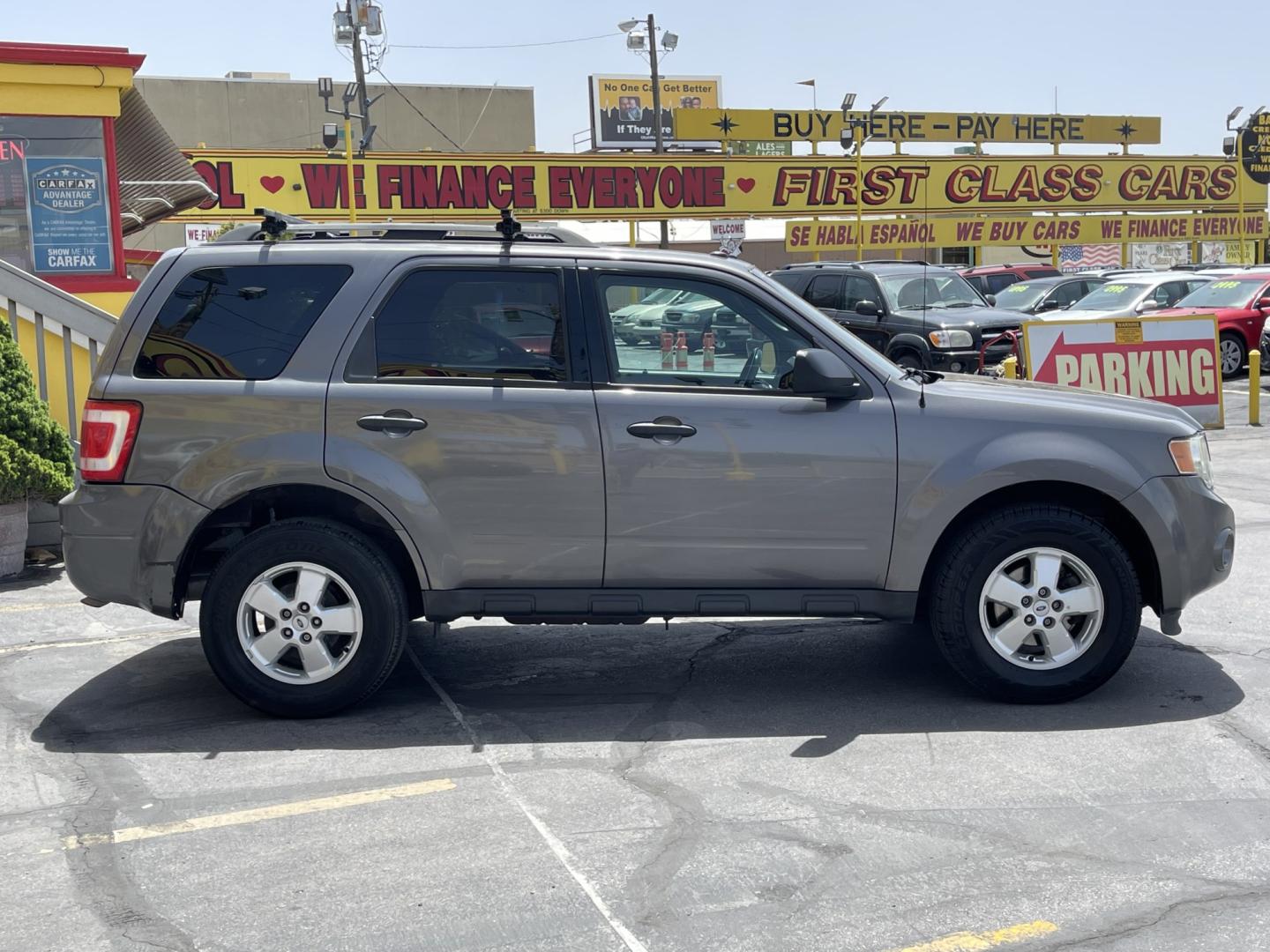 2009 Sterling Gray Metallic /Gray Cloth Ford Escape XLT 4WD V6 (1FMCU93G89K) with an 3.0L V6 engine, Automatic transmission, located at 801 South State Street, Salt Lake City, UT, 84111, (801) 328-0098, 40.751953, -111.888206 - Life is crazy. Now is the time to buy! All of our prices are just dollars above our cost. These prices will change as soon as life isn't so crazy. So please call or come in. We are here to save you a lot of money! Our service department is OPEN DAILY to help with any of your service needs. P- Photo#5