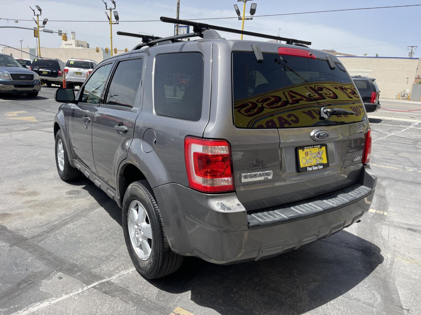 2009 Sterling Gray Metallic /Gray Cloth Ford Escape XLT 4WD V6 (1FMCU93G89K) with an 3.0L V6 engine, Automatic transmission, located at 801 South State Street, Salt Lake City, UT, 84111, (801) 328-0098, 40.751953, -111.888206 - Life is crazy. Now is the time to buy! All of our prices are just dollars above our cost. These prices will change as soon as life isn't so crazy. So please call or come in. We are here to save you a lot of money! Our service department is OPEN DAILY to help with any of your service needs. P- Photo#8