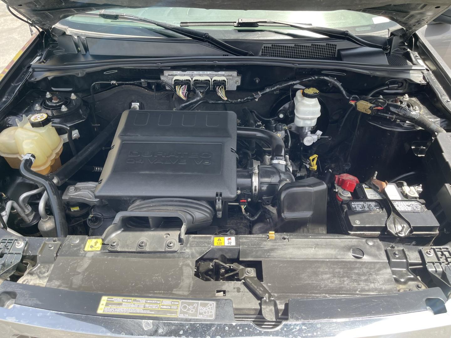 2009 Sterling Gray Metallic /Gray Cloth Ford Escape XLT 4WD V6 (1FMCU93G89K) with an 3.0L V6 engine, Automatic transmission, located at 801 South State Street, Salt Lake City, UT, 84111, (801) 328-0098, 40.751953, -111.888206 - Life is crazy. Now is the time to buy! All of our prices are just dollars above our cost. These prices will change as soon as life isn't so crazy. So please call or come in. We are here to save you a lot of money! Our service department is OPEN DAILY to help with any of your service needs. P- Photo#13