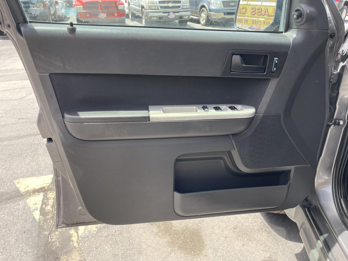 2009 Sterling Gray Metallic /Gray Cloth Ford Escape XLT 4WD V6 (1FMCU93G89K) with an 3.0L V6 engine, Automatic transmission, located at 801 South State Street, Salt Lake City, UT, 84111, (801) 328-0098, 40.751953, -111.888206 - Life is crazy. Now is the time to buy! All of our prices are just dollars above our cost. These prices will change as soon as life isn't so crazy. So please call or come in. We are here to save you a lot of money! Our service department is OPEN DAILY to help with any of your service needs. P- Photo#14