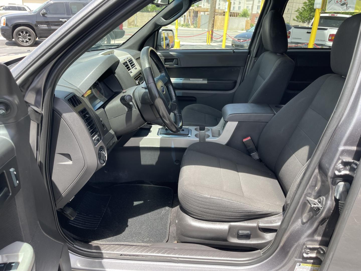 2009 Sterling Gray Metallic /Gray Cloth Ford Escape XLT 4WD V6 (1FMCU93G89K) with an 3.0L V6 engine, Automatic transmission, located at 801 South State Street, Salt Lake City, UT, 84111, (801) 328-0098, 40.751953, -111.888206 - Life is crazy. Now is the time to buy! All of our prices are just dollars above our cost. These prices will change as soon as life isn't so crazy. So please call or come in. We are here to save you a lot of money! Our service department is OPEN DAILY to help with any of your service needs. P- Photo#15