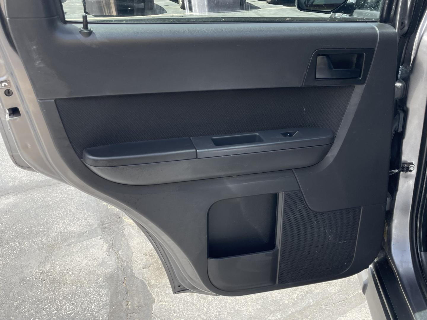 2009 Sterling Gray Metallic /Gray Cloth Ford Escape XLT 4WD V6 (1FMCU93G89K) with an 3.0L V6 engine, Automatic transmission, located at 801 South State Street, Salt Lake City, UT, 84111, (801) 328-0098, 40.751953, -111.888206 - Life is crazy. Now is the time to buy! All of our prices are just dollars above our cost. These prices will change as soon as life isn't so crazy. So please call or come in. We are here to save you a lot of money! Our service department is OPEN DAILY to help with any of your service needs. P- Photo#22