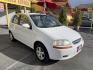 2005 Galaxy White /Gray Cloth Chevrolet Aveo LS (KL1TD62615B) with an 2.2L 4 Cyl. engine, Manual transmission, located at 801 South State Street, Salt Lake City, UT, 84111, (801) 328-0098, 40.751953, -111.888206 - Experience excellent performance with this 2005 Chevrolet Aveo! With its sleek design, efficient fuel consumption, and spacious interior, it's the perfect combination of style and convenience. Affordable and well-maintained, this used Aveo offers a reliable and comfortable ride. Make it yours today! - Photo#3