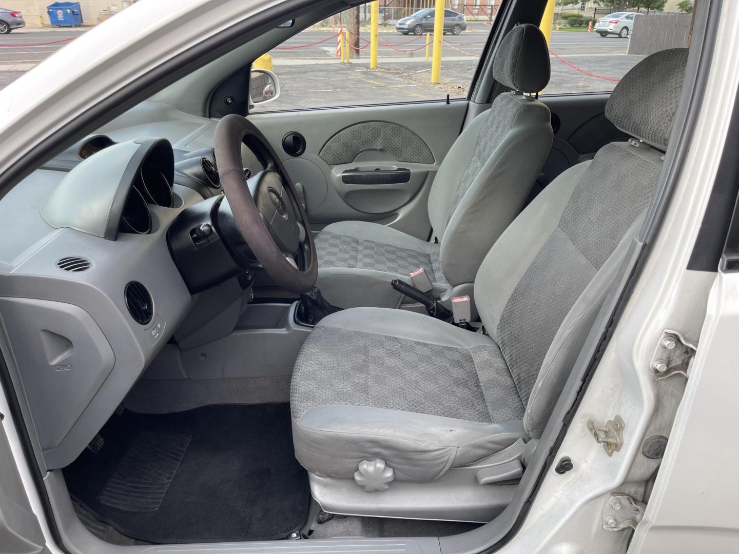 2005 Galaxy White /Gray Cloth Chevrolet Aveo LS (KL1TD62615B) with an 2.2L 4 Cyl. engine, Manual transmission, located at 801 South State Street, Salt Lake City, UT, 84111, (801) 328-0098, 40.751953, -111.888206 - Experience excellent performance with this 2005 Chevrolet Aveo! With its sleek design, efficient fuel consumption, and spacious interior, it's the perfect combination of style and convenience. Affordable and well-maintained, this used Aveo offers a reliable and comfortable ride. Make it yours today! - Photo#12