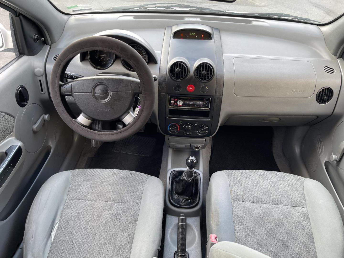 2005 Galaxy White /Gray Cloth Chevrolet Aveo LS (KL1TD62615B) with an 2.2L 4 Cyl. engine, Manual transmission, located at 801 South State Street, Salt Lake City, UT, 84111, (801) 328-0098, 40.751953, -111.888206 - Experience excellent performance with this 2005 Chevrolet Aveo! With its sleek design, efficient fuel consumption, and spacious interior, it's the perfect combination of style and convenience. Affordable and well-maintained, this used Aveo offers a reliable and comfortable ride. Make it yours today! - Photo#14