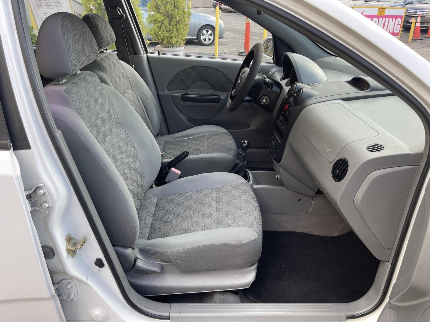 2005 Galaxy White /Gray Cloth Chevrolet Aveo LS (KL1TD62615B) with an 2.2L 4 Cyl. engine, Manual transmission, located at 801 South State Street, Salt Lake City, UT, 84111, (801) 328-0098, 40.751953, -111.888206 - Experience excellent performance with this 2005 Chevrolet Aveo! With its sleek design, efficient fuel consumption, and spacious interior, it's the perfect combination of style and convenience. Affordable and well-maintained, this used Aveo offers a reliable and comfortable ride. Make it yours today! - Photo#28