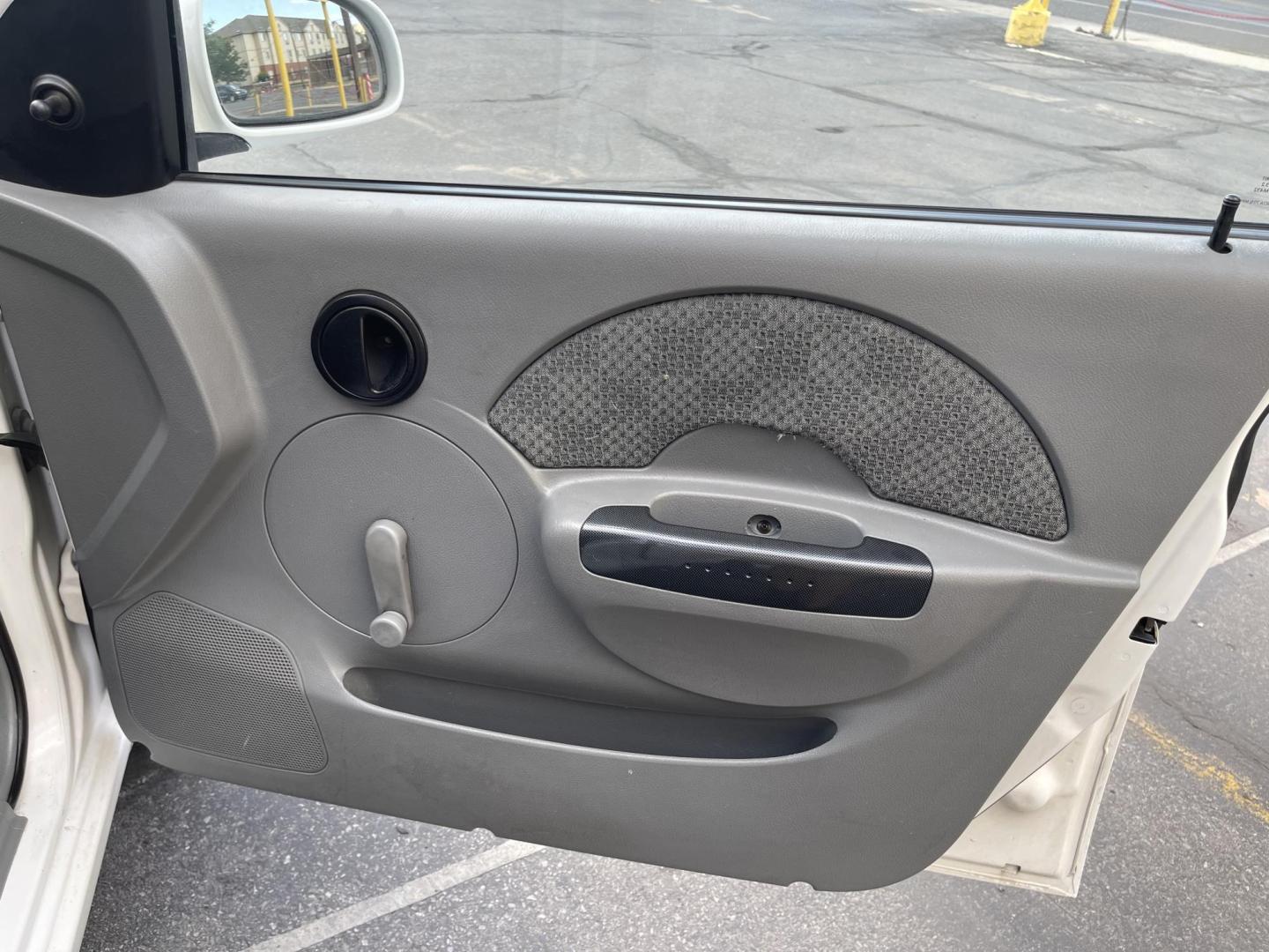 2005 Galaxy White /Gray Cloth Chevrolet Aveo LS (KL1TD62615B) with an 2.2L 4 Cyl. engine, Manual transmission, located at 801 South State Street, Salt Lake City, UT, 84111, (801) 328-0098, 40.751953, -111.888206 - Experience excellent performance with this 2005 Chevrolet Aveo! With its sleek design, efficient fuel consumption, and spacious interior, it's the perfect combination of style and convenience. Affordable and well-maintained, this used Aveo offers a reliable and comfortable ride. Make it yours today! - Photo#29