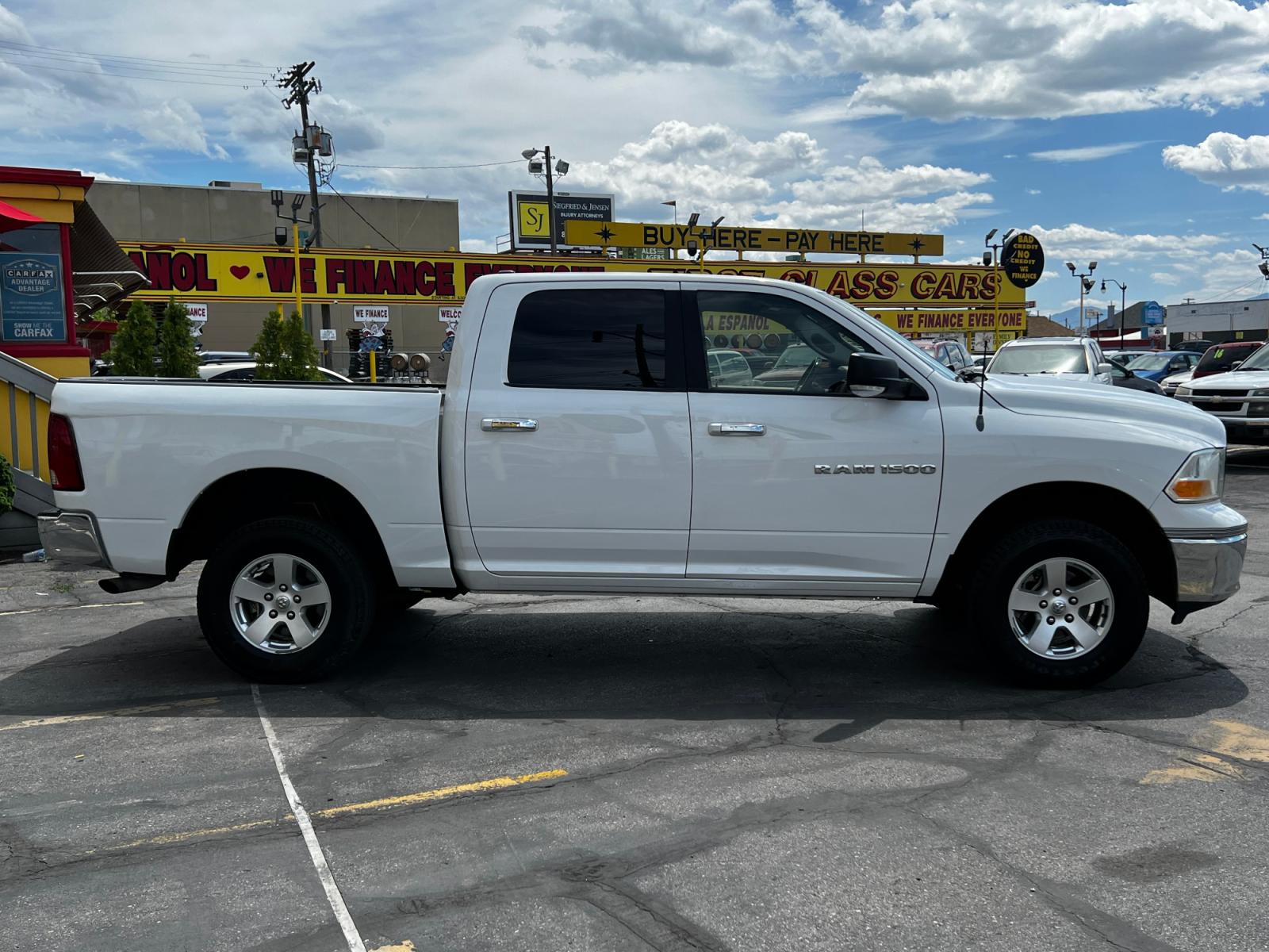 2012 Bright White /Gray Cloth Dodge Ram 1500 SLT Crew Cab 4WD (1C6RD7LP5CS) with an 4.7L V8 engine, Automatic transmission, located at 801 South State Street, Salt Lake City, UT, 84111, (801) 328-0098, 40.751953, -111.888206 - Life is crazy. Now is the time to buy! All of our prices are just dollars above our cost. These prices will change as soon as life isn't so crazy. So please call or come in. We are here to save you a lot of money! Our service department is OPEN DAILY to help with any of your service needs. P - Photo #5