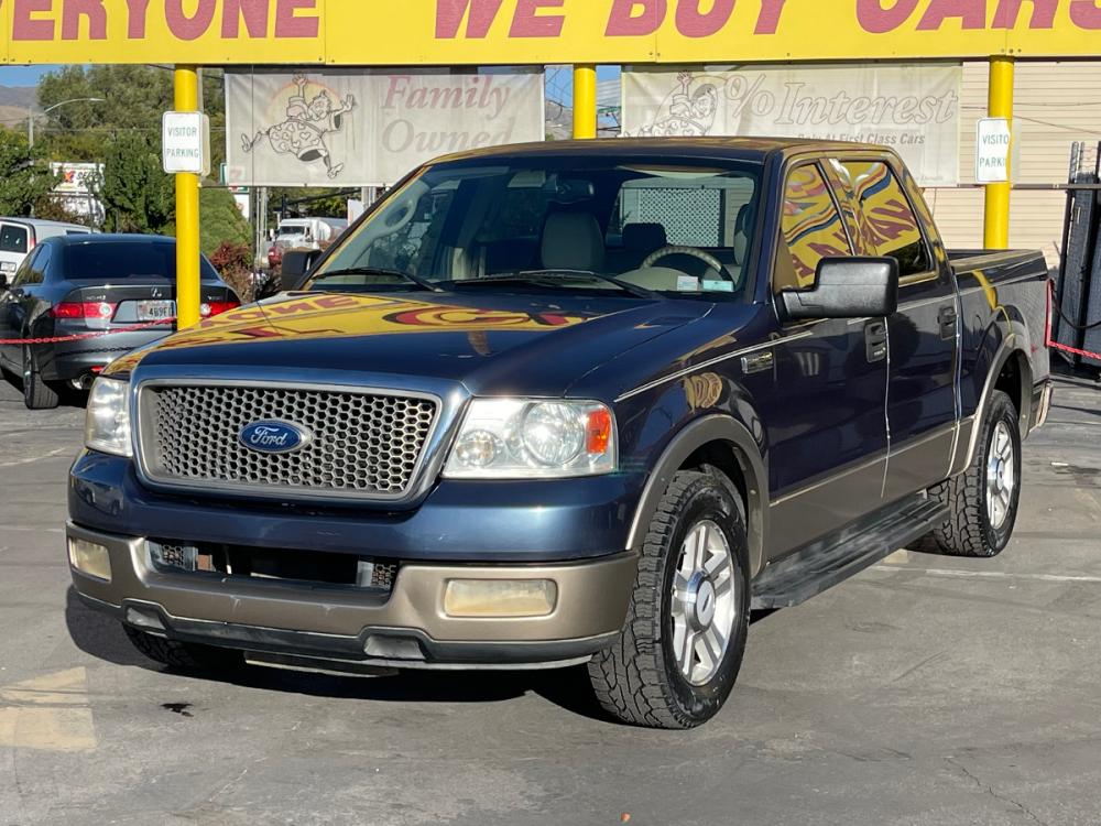 2004 True Blue Metallic /Tan Leather Ford F-150 Lariat SuperCrew (1FTPW12504K) with an 5.4L V8 engine, Automatic transmission, located at 801 South State Street, Salt Lake City, UT, 84111, (801) 328-0098, 40.751953, -111.888206 - Photo #2
