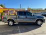 2004 True Blue Metallic /Tan Leather Ford F-150 Lariat SuperCrew (1FTPW12504K) with an 5.4L V8 engine, Automatic transmission, located at 801 South State Street, Salt Lake City, UT, 84111, (801) 328-0098, 40.751953, -111.888206 - Photo #5
