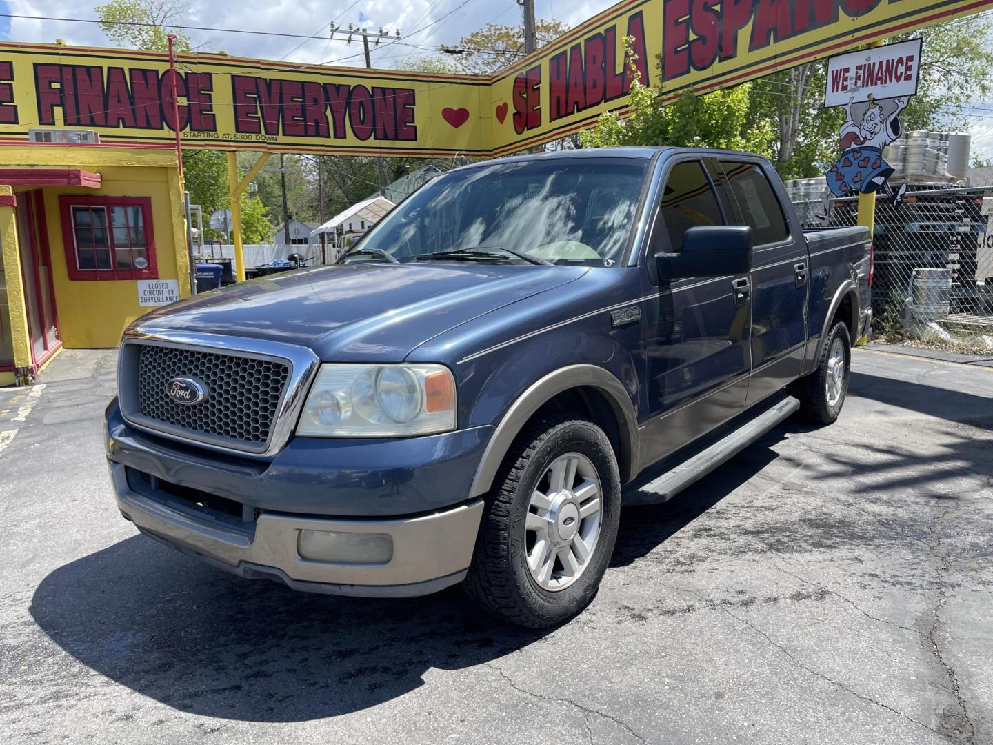 2004 True Blue Metallic /Tan Leather Ford F-150 Lariat SuperCrew (1FTPW12504K) with an 5.4L V8 engine, Automatic transmission, located at 801 South State Street, Salt Lake City, UT, 84111, (801) 328-0098, 40.751953, -111.888206 - Vehicle Features: Lariat Model, SuperCrew 4 Door, ABS Brakes, Traction Control, Cruise Control, Air Conditioning, AM/FM Stereo, CD Player, Leather Interior, Power Windows, Power Locks, Power Mirrors, Heated Seats, Power Seat(s), Privacy Glass, Tow Package, Running Boards, Alloy Wheels, Bedliner. Li - Photo#1