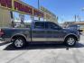 2004 True Blue Metallic /Tan Leather Ford F-150 Lariat SuperCrew (1FTPW12504K) with an 5.4L V8 engine, Automatic transmission, located at 801 South State Street, Salt Lake City, UT, 84111, (801) 328-0098, 40.751953, -111.888206 - Vehicle Features: Lariat Model, SuperCrew 4 Door, ABS Brakes, Traction Control, Cruise Control, Air Conditioning, AM/FM Stereo, CD Player, Leather Interior, Power Windows, Power Locks, Power Mirrors, Heated Seats, Power Seat(s), Privacy Glass, Tow Package, Running Boards, Alloy Wheels, Bedliner. Li - Photo#4