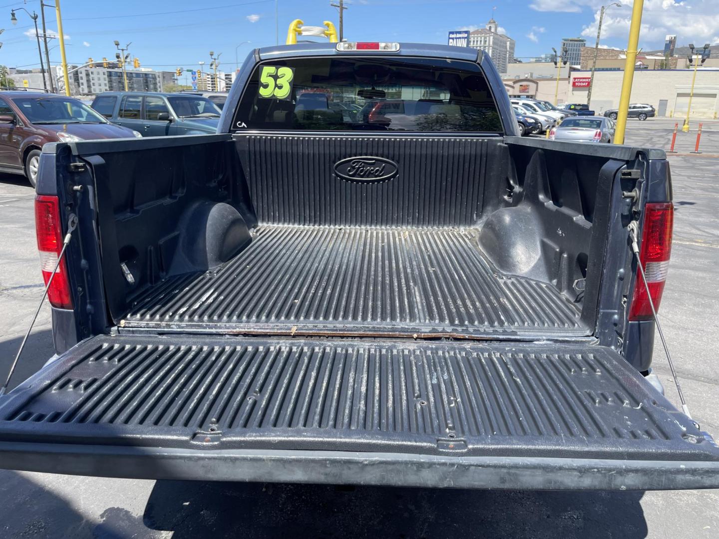 2004 True Blue Metallic /Tan Leather Ford F-150 Lariat SuperCrew (1FTPW12504K) with an 5.4L V8 engine, Automatic transmission, located at 801 South State Street, Salt Lake City, UT, 84111, (801) 328-0098, 40.751953, -111.888206 - Vehicle Features: Lariat Model, SuperCrew 4 Door, ABS Brakes, Traction Control, Cruise Control, Air Conditioning, AM/FM Stereo, CD Player, Leather Interior, Power Windows, Power Locks, Power Mirrors, Heated Seats, Power Seat(s), Privacy Glass, Tow Package, Running Boards, Alloy Wheels, Bedliner. Li - Photo#7