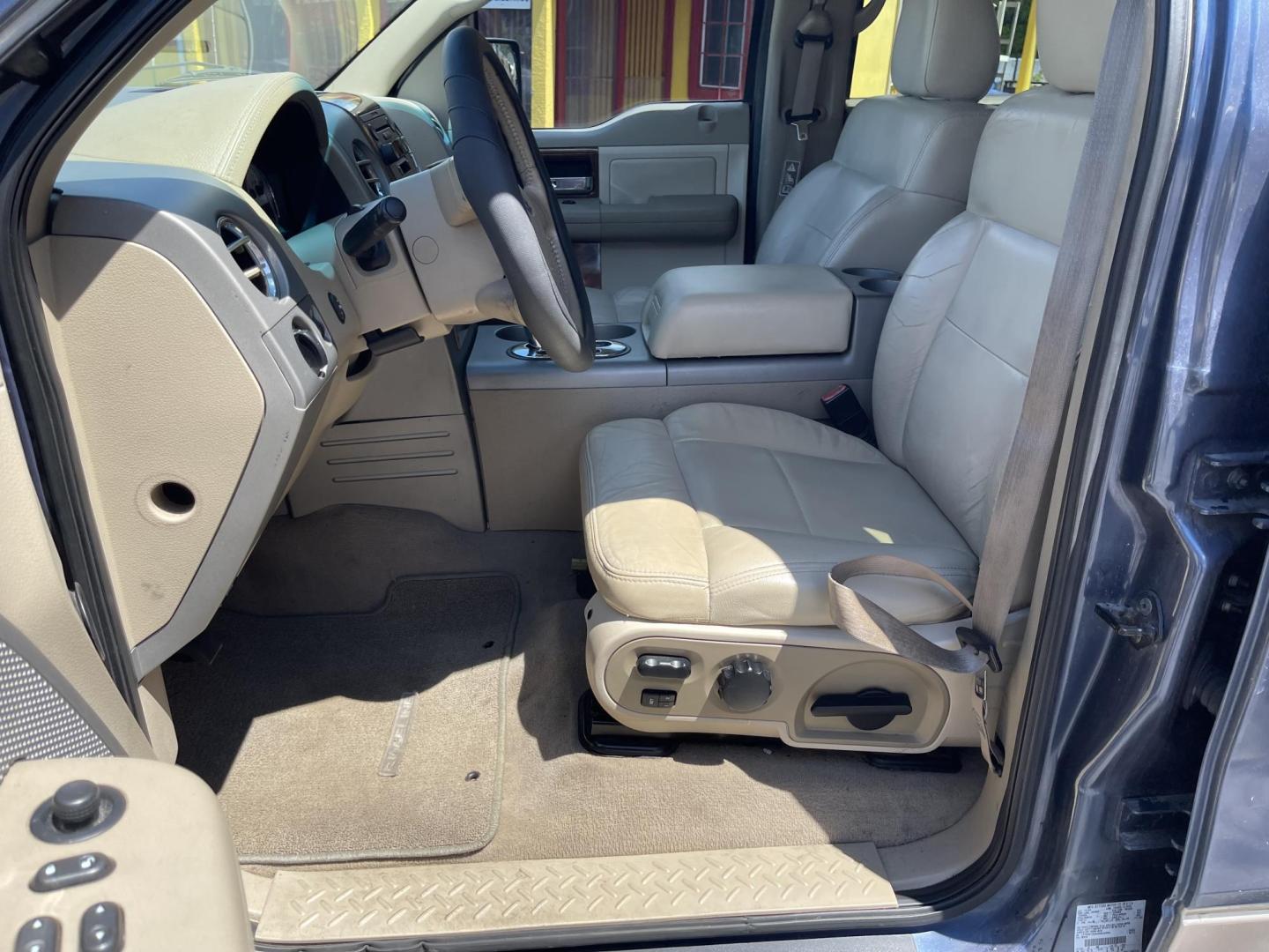 2004 True Blue Metallic /Tan Leather Ford F-150 Lariat SuperCrew (1FTPW12504K) with an 5.4L V8 engine, Automatic transmission, located at 801 South State Street, Salt Lake City, UT, 84111, (801) 328-0098, 40.751953, -111.888206 - Vehicle Features: Lariat Model, SuperCrew 4 Door, ABS Brakes, Traction Control, Cruise Control, Air Conditioning, AM/FM Stereo, CD Player, Leather Interior, Power Windows, Power Locks, Power Mirrors, Heated Seats, Power Seat(s), Privacy Glass, Tow Package, Running Boards, Alloy Wheels, Bedliner. Li - Photo#12