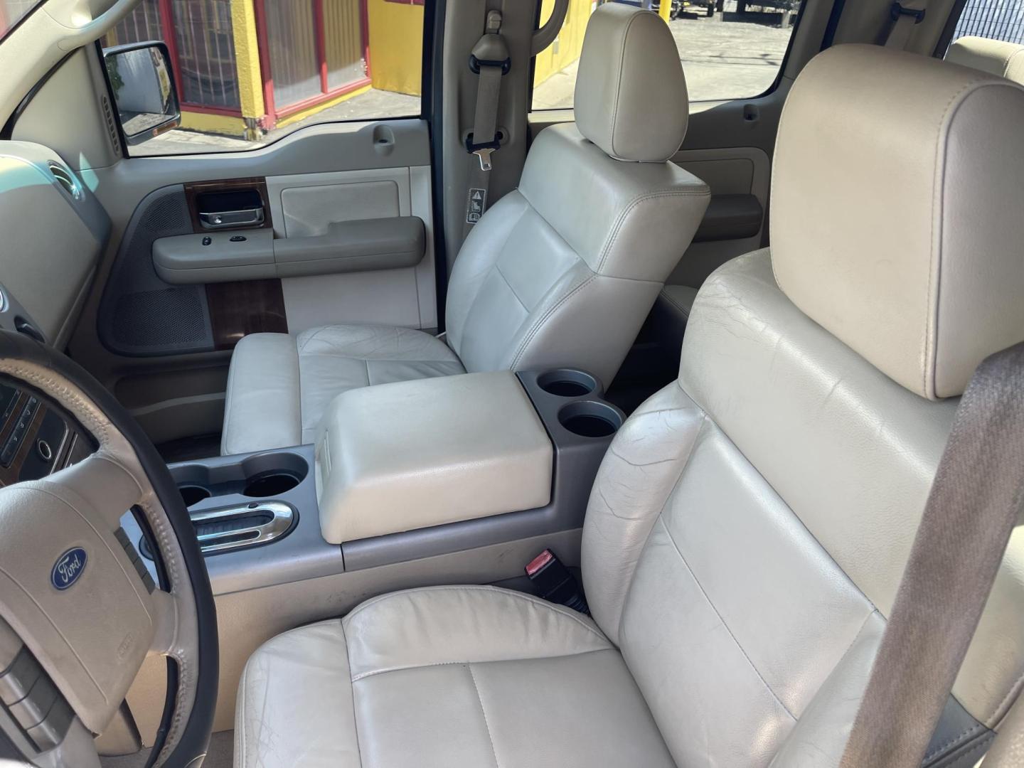 2004 True Blue Metallic /Tan Leather Ford F-150 Lariat SuperCrew (1FTPW12504K) with an 5.4L V8 engine, Automatic transmission, located at 801 South State Street, Salt Lake City, UT, 84111, (801) 328-0098, 40.751953, -111.888206 - Vehicle Features: Lariat Model, SuperCrew 4 Door, ABS Brakes, Traction Control, Cruise Control, Air Conditioning, AM/FM Stereo, CD Player, Leather Interior, Power Windows, Power Locks, Power Mirrors, Heated Seats, Power Seat(s), Privacy Glass, Tow Package, Running Boards, Alloy Wheels, Bedliner. Li - Photo#14