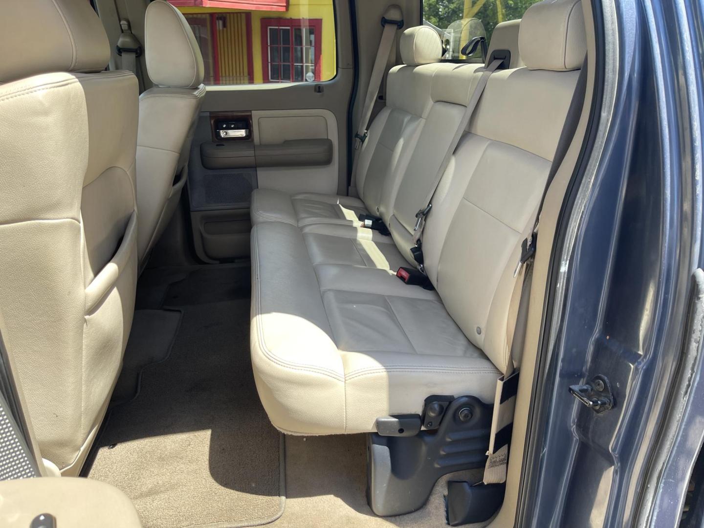 2004 True Blue Metallic /Tan Leather Ford F-150 Lariat SuperCrew (1FTPW12504K) with an 5.4L V8 engine, Automatic transmission, located at 801 South State Street, Salt Lake City, UT, 84111, (801) 328-0098, 40.751953, -111.888206 - Vehicle Features: Lariat Model, SuperCrew 4 Door, ABS Brakes, Traction Control, Cruise Control, Air Conditioning, AM/FM Stereo, CD Player, Leather Interior, Power Windows, Power Locks, Power Mirrors, Heated Seats, Power Seat(s), Privacy Glass, Tow Package, Running Boards, Alloy Wheels, Bedliner. Li - Photo#15