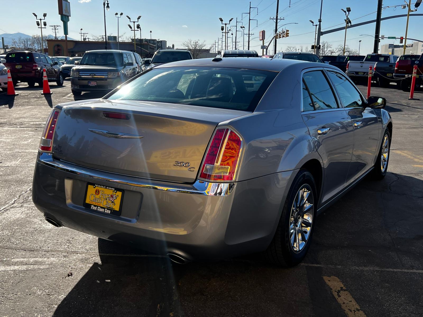 2014 Billet Metallic /Black Leather Chrysler 300 C (2C3CCAEG1EH) with an 3.6L V6 engine, Automatic transmission, located at 801 South State Street, Salt Lake City, UT, 84111, (801) 328-0098, 40.751953, -111.888206 - Life is crazy. Now is the time to buy! All of our prices are just dollars above our cost. These prices will change as soon as life isn't so crazy. So please call or come in. We are here to save you a lot of money! Our service department is OPEN DAILY to help with any of your service needs. P - Photo #6