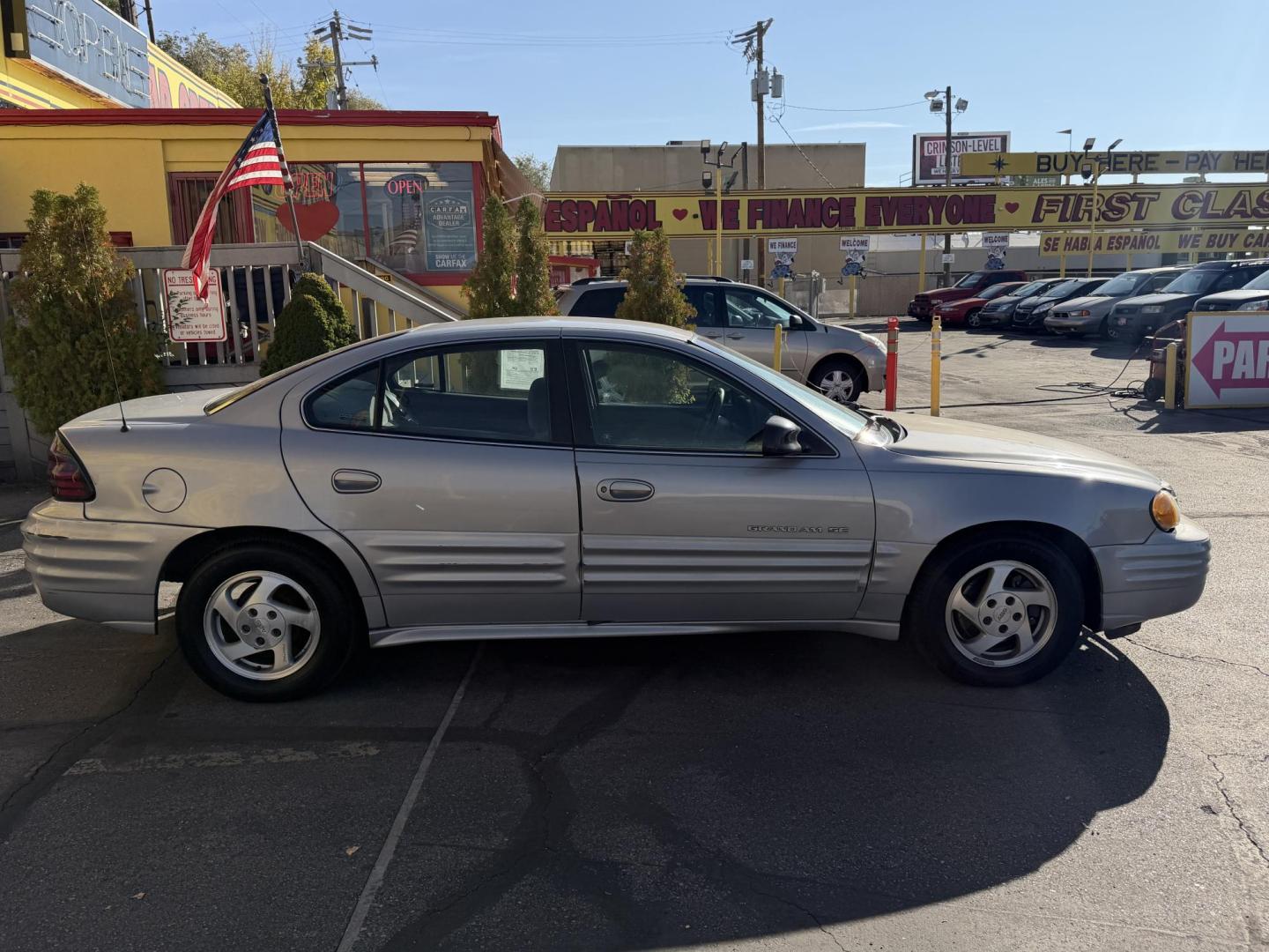2000 Silvermist Metallic /Gray Cloth Pontiac Grand AM SE1 (1G2NF52T0YC) with an 2.4L 4 Cyl. engine, Automatic transmission, located at 801 South State Street, Salt Lake City, UT, 84111, (801) 328-0098, 40.751953, -111.888206 - Clean title! Vehicle Features: SE1 Model, ABS Brakes, Air Conditioning, Alloy Wheels, AM/FM Stereo, Automatic Transmission, CD Audio, Cloth Seats, Cruise Control, Power Locks, Power Mirrors, Power Windows, Rear Defroster, Traction Control * All advertised prices are just dollars above cost to ma - Photo#4