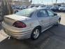 2000 Silvermist Metallic /Gray Cloth Pontiac Grand AM SE1 (1G2NF52T0YC) with an 2.4L 4 Cyl. engine, Automatic transmission, located at 801 South State Street, Salt Lake City, UT, 84111, (801) 328-0098, 40.751953, -111.888206 - Clean title! Vehicle Features: SE1 Model, ABS Brakes, Air Conditioning, Alloy Wheels, AM/FM Stereo, Automatic Transmission, CD Audio, Cloth Seats, Cruise Control, Power Locks, Power Mirrors, Power Windows, Rear Defroster, Traction Control * All advertised prices are just dollars above cost to ma - Photo#5