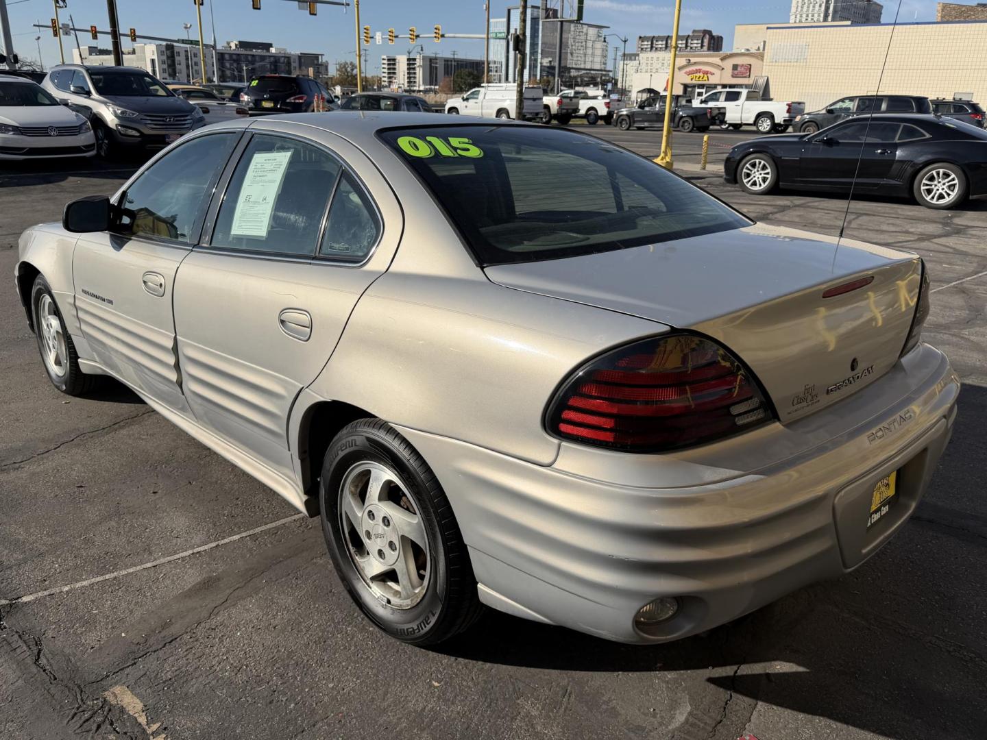 2000 Silvermist Metallic /Gray Cloth Pontiac Grand AM SE1 (1G2NF52T0YC) with an 2.4L 4 Cyl. engine, Automatic transmission, located at 801 South State Street, Salt Lake City, UT, 84111, (801) 328-0098, 40.751953, -111.888206 - Clean title! Vehicle Features: SE1 Model, ABS Brakes, Air Conditioning, Alloy Wheels, AM/FM Stereo, Automatic Transmission, CD Audio, Cloth Seats, Cruise Control, Power Locks, Power Mirrors, Power Windows, Rear Defroster, Traction Control * All advertised prices are just dollars above cost to ma - Photo#7